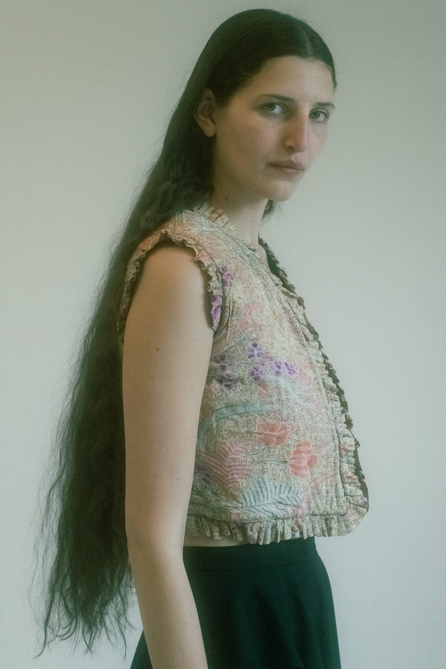 A quilted vest, but not as you know it—this vintage piece speaks in whispers of playful seduction.