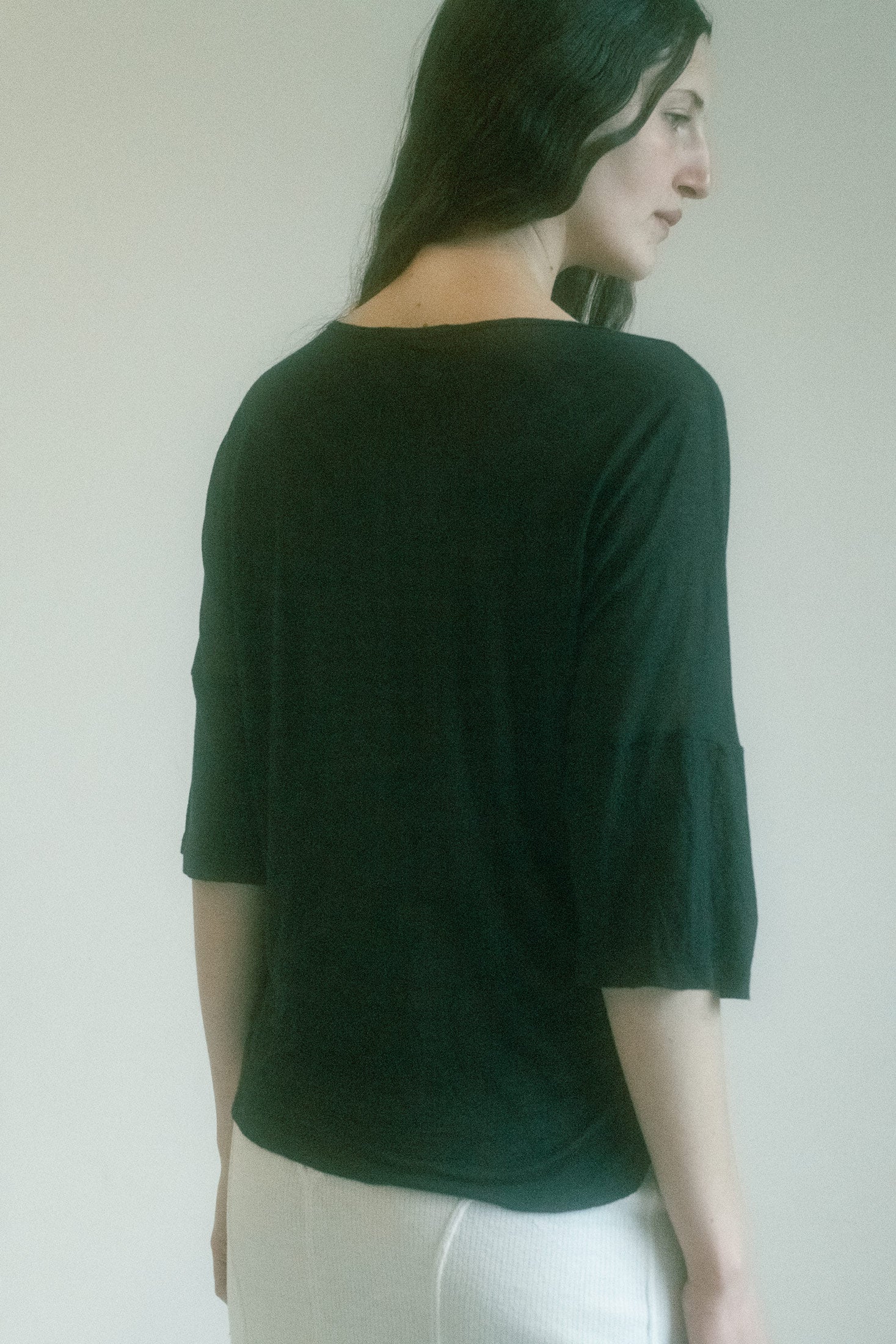 A chest pocket, simple yet captivating, adds just the right touch of understated character—a secret tucked away in plain sight.