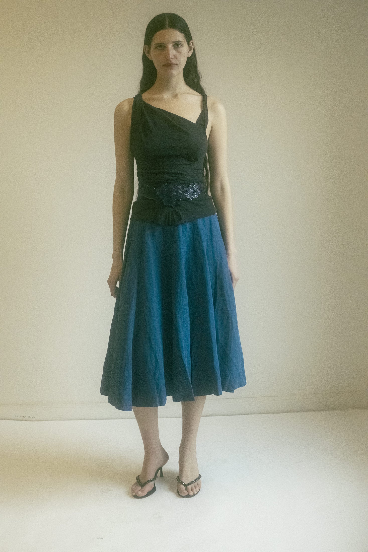 The Vintage Kenzo Mid Skirt—a piece that doesn’t just exist in a wardrobe, but in a moment. It’s fluid, it’s free, and it’s full of promise.