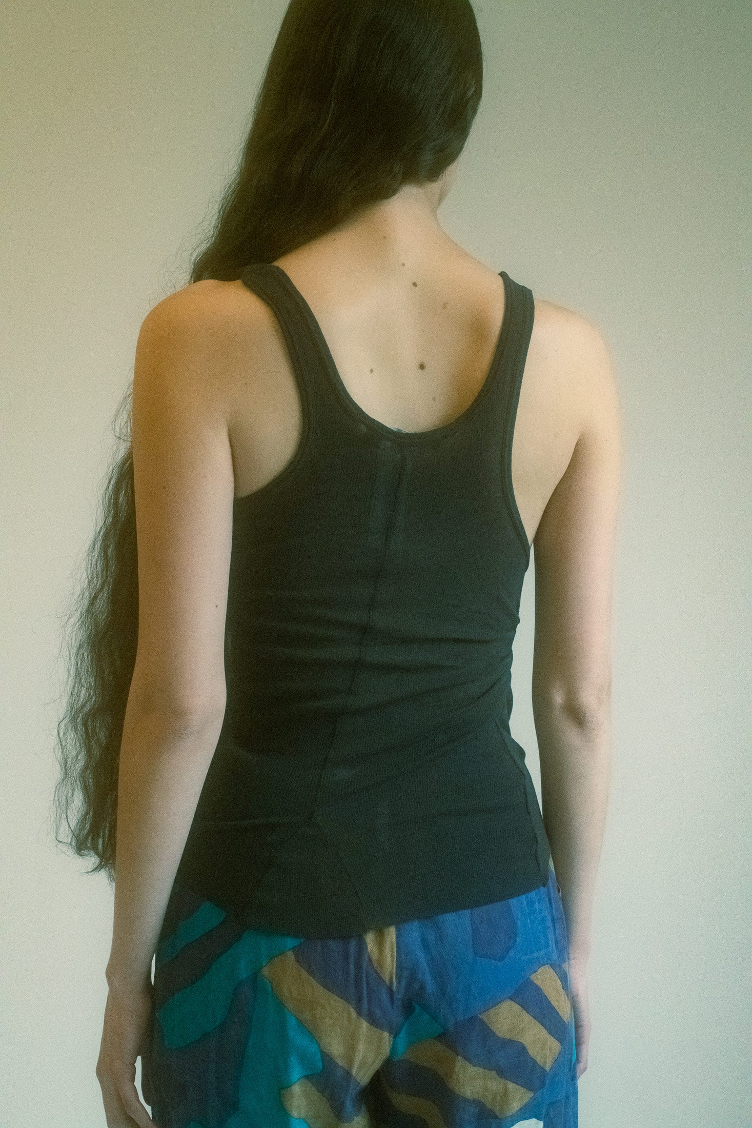 This top is a unique, special piece—its sensual fit and sheer allure make it both desirable and timeless.