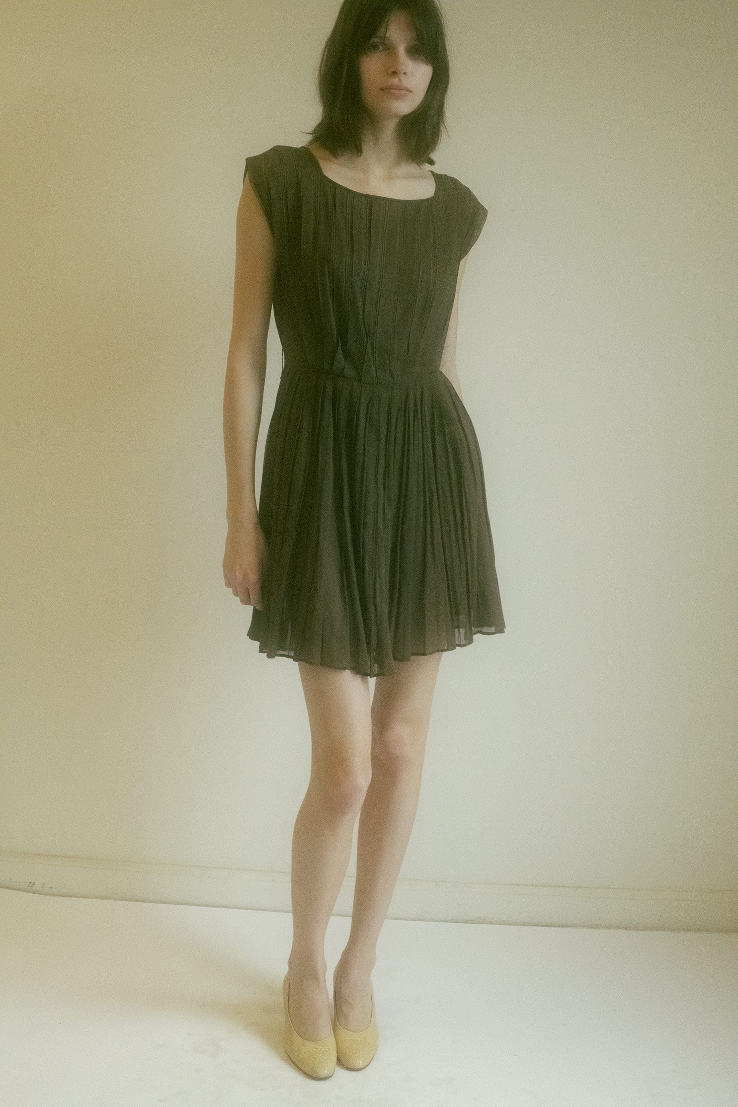Every pleat, every sheer detail adds to the dynamic, ethereal aura that surrounds you.