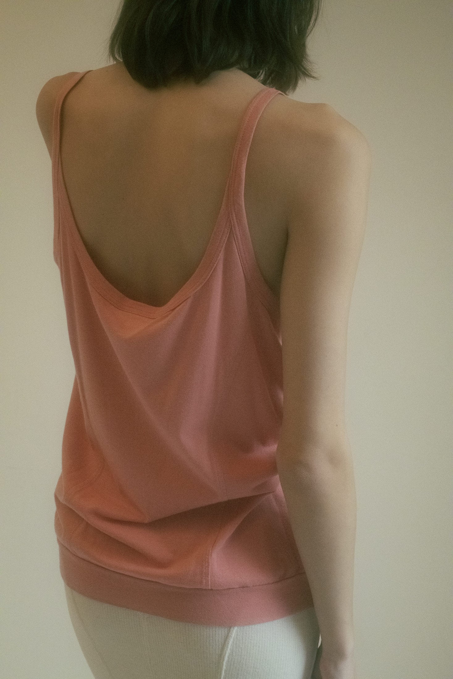 A peachy-pink hue that screams innocence with a smirk. Like she’s got soft hands and a sharp tongue.