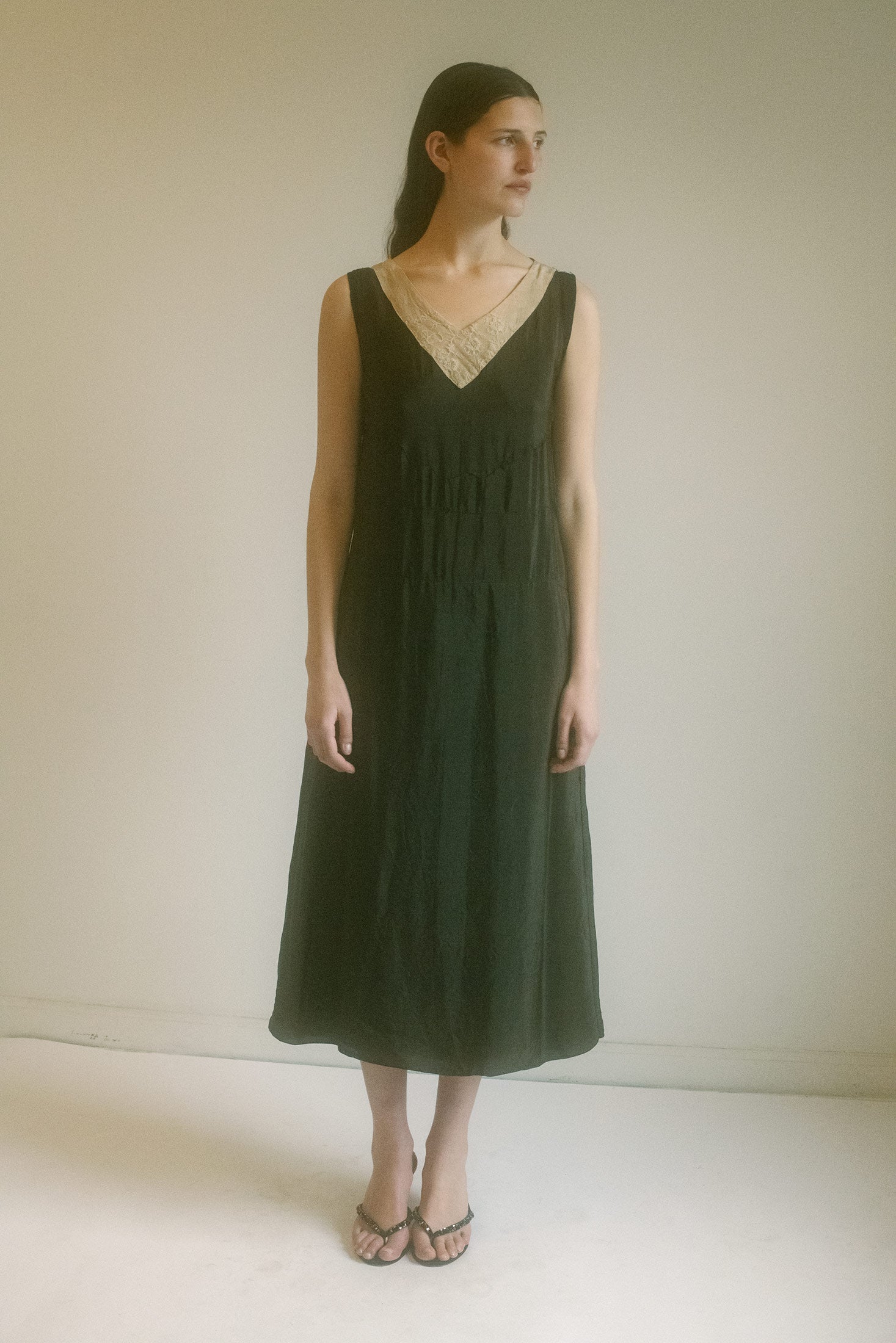 In a world where elegance speaks without a word, the Lace 30's Slip Dress is the quiet statement you’ve been waiting for.