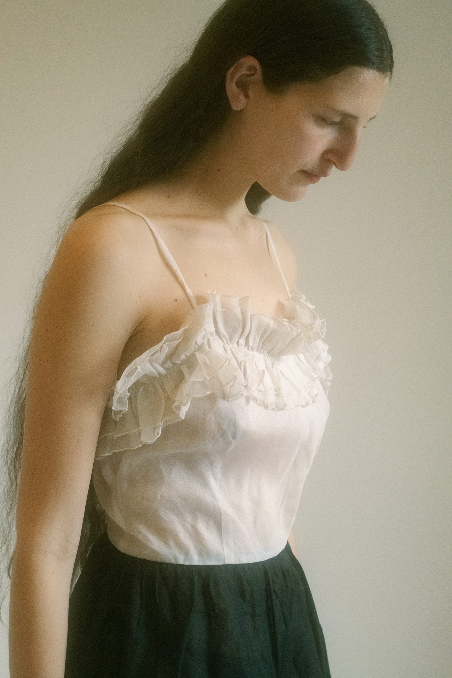 Then the waist—cinched, sculpted, like the delicate hourglass.