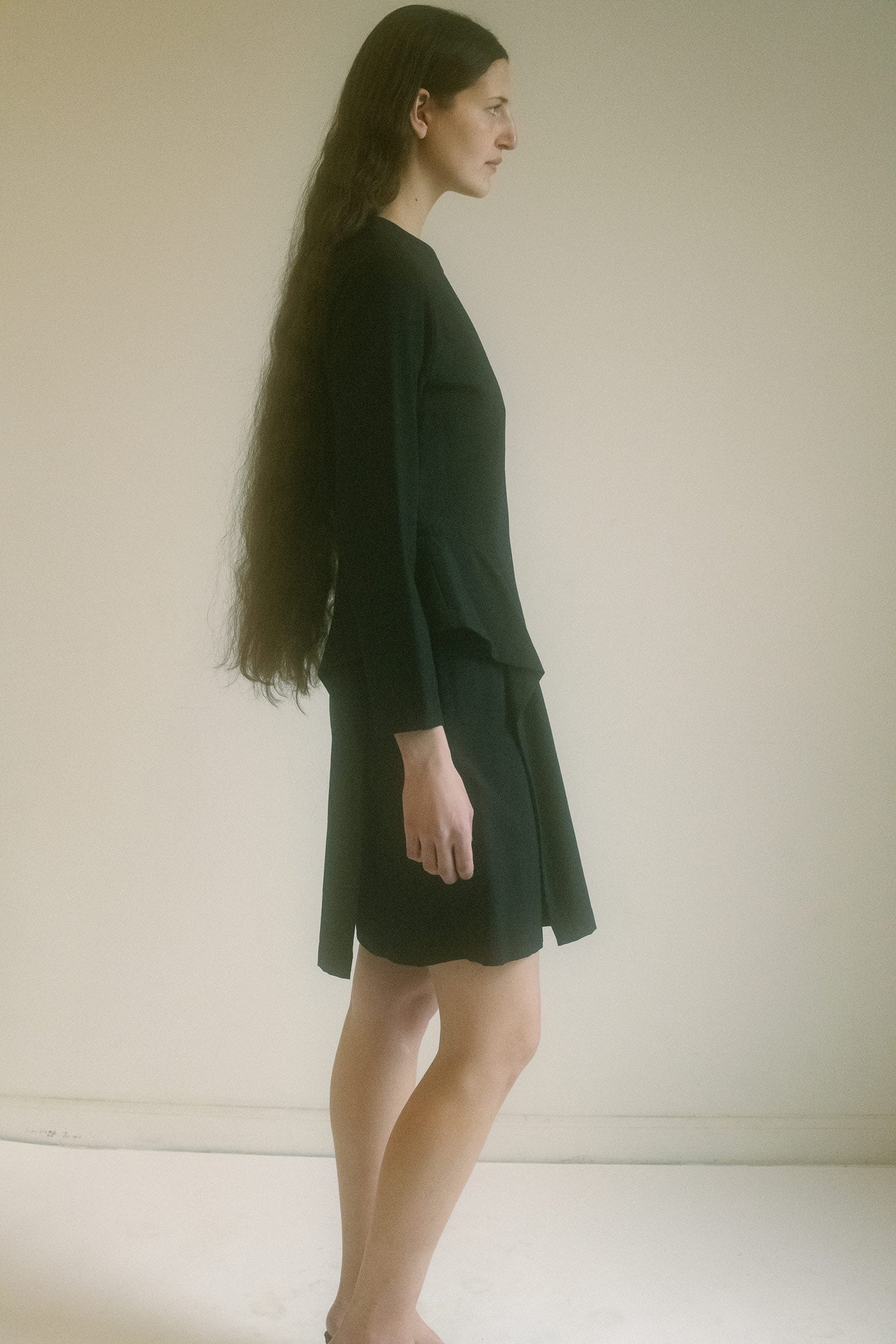 Soft and ethereal, this piece drapes delicately over the body, evoking a sense of mystery with every step you take.