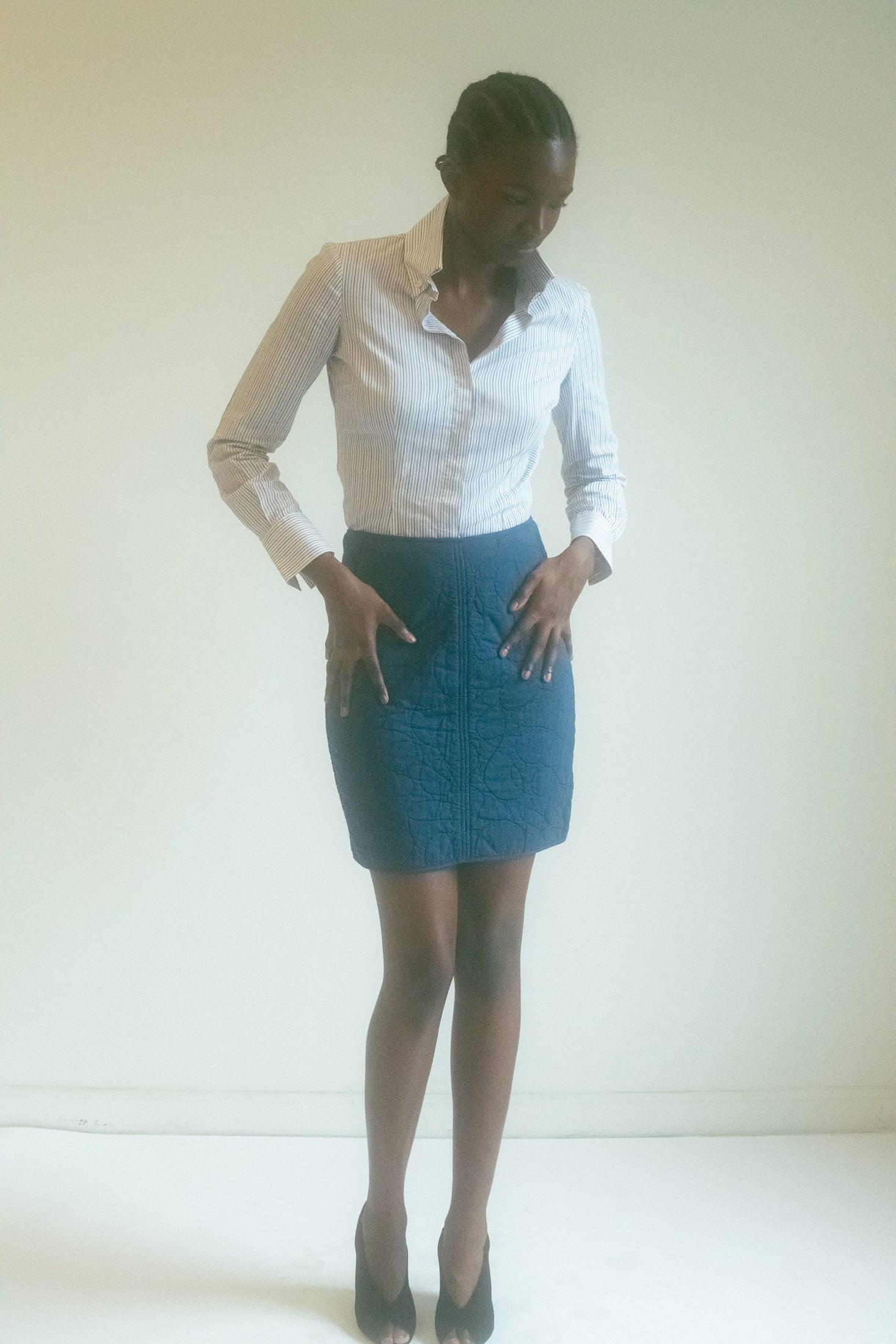 The Quilted Mini Skirt by Callaghan. A piece so sleek, so effortless in its chicness — the woman who wears it always poised, always in control.