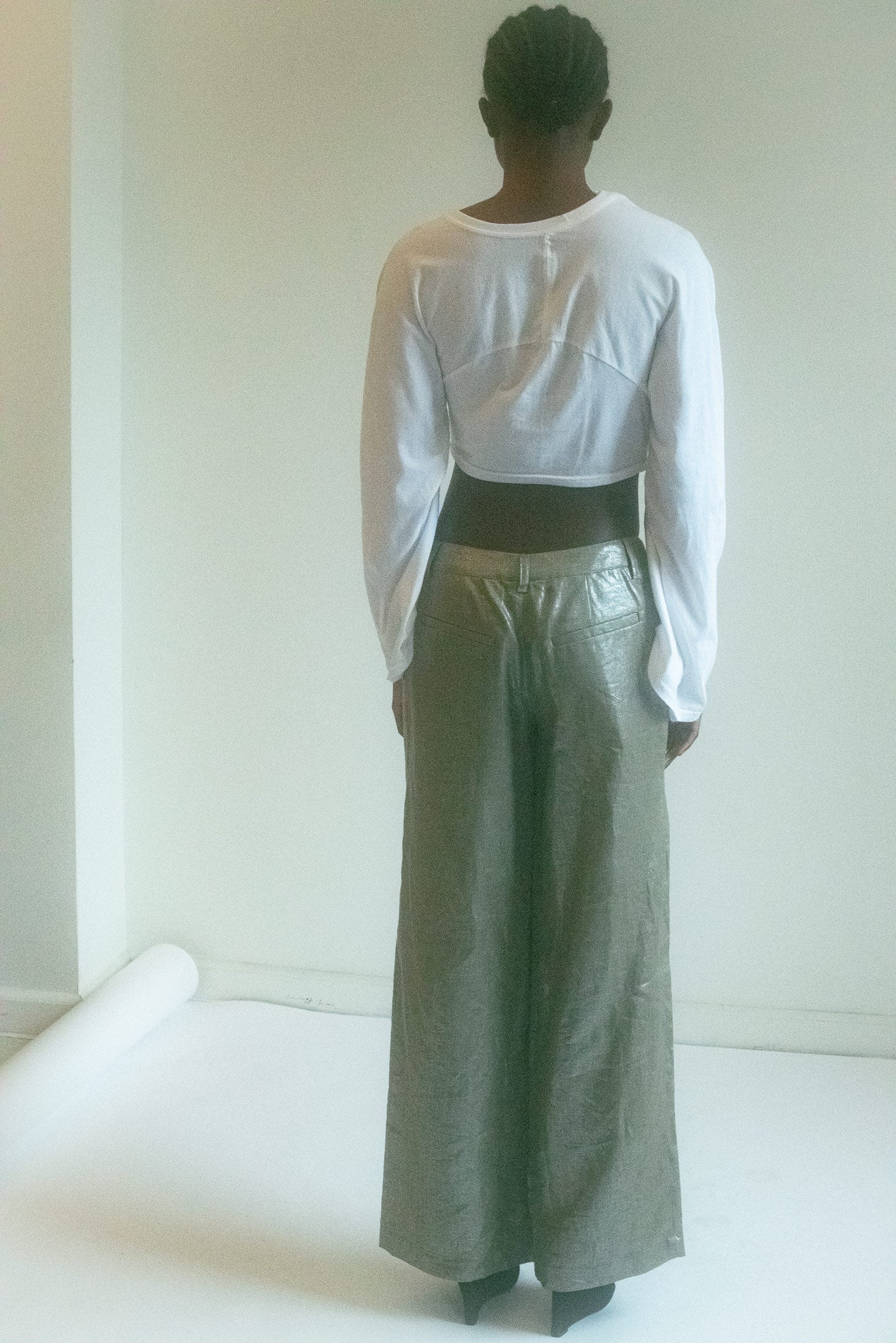 Soft and sensual against the skin, this top moves with ease and grace, offering a versatile, timeless elegance that fits seamlessly into the city lifestyle.