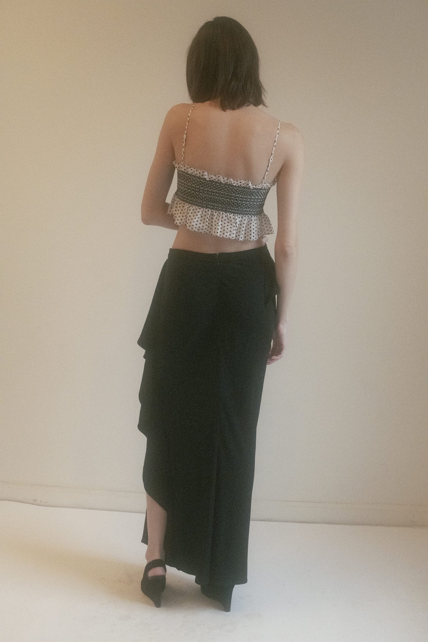 The Lisa Marie Fernandez Crop Top moves with dynamic energy, its ethereal design bringing a cinematic quality to your everyday wardrobe.