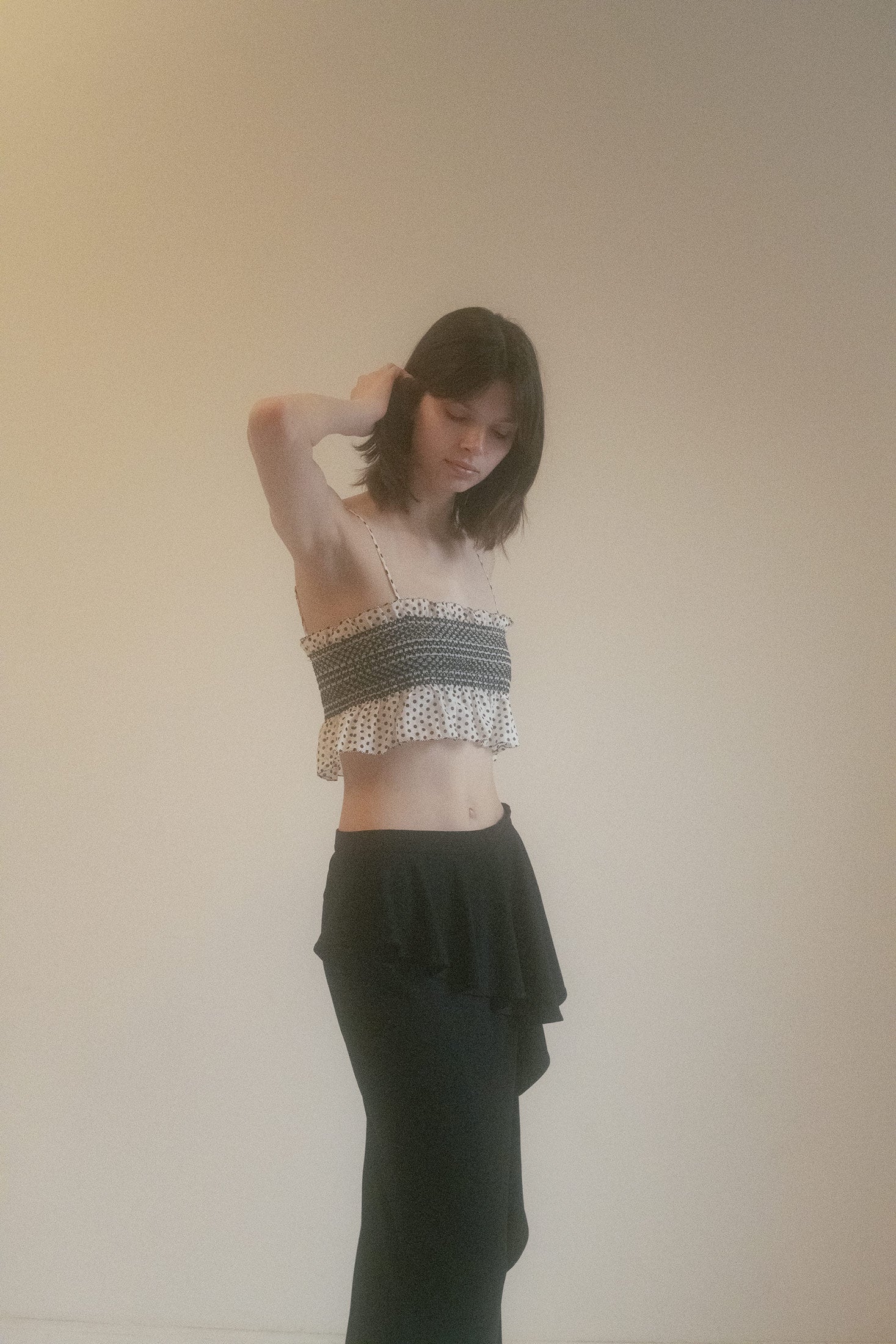 The tank top style is timeless and versatile, offering endless possibilities for styling, whether layered or worn alone.