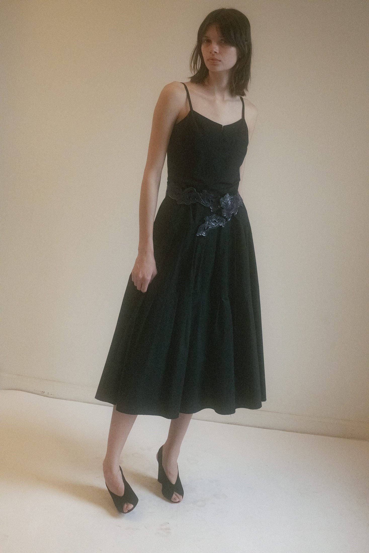 This tiered panel dress by Creatures of Comfort is stitched with a certain quiet allure—structured just enough to imply form, yet soft in its delivery.