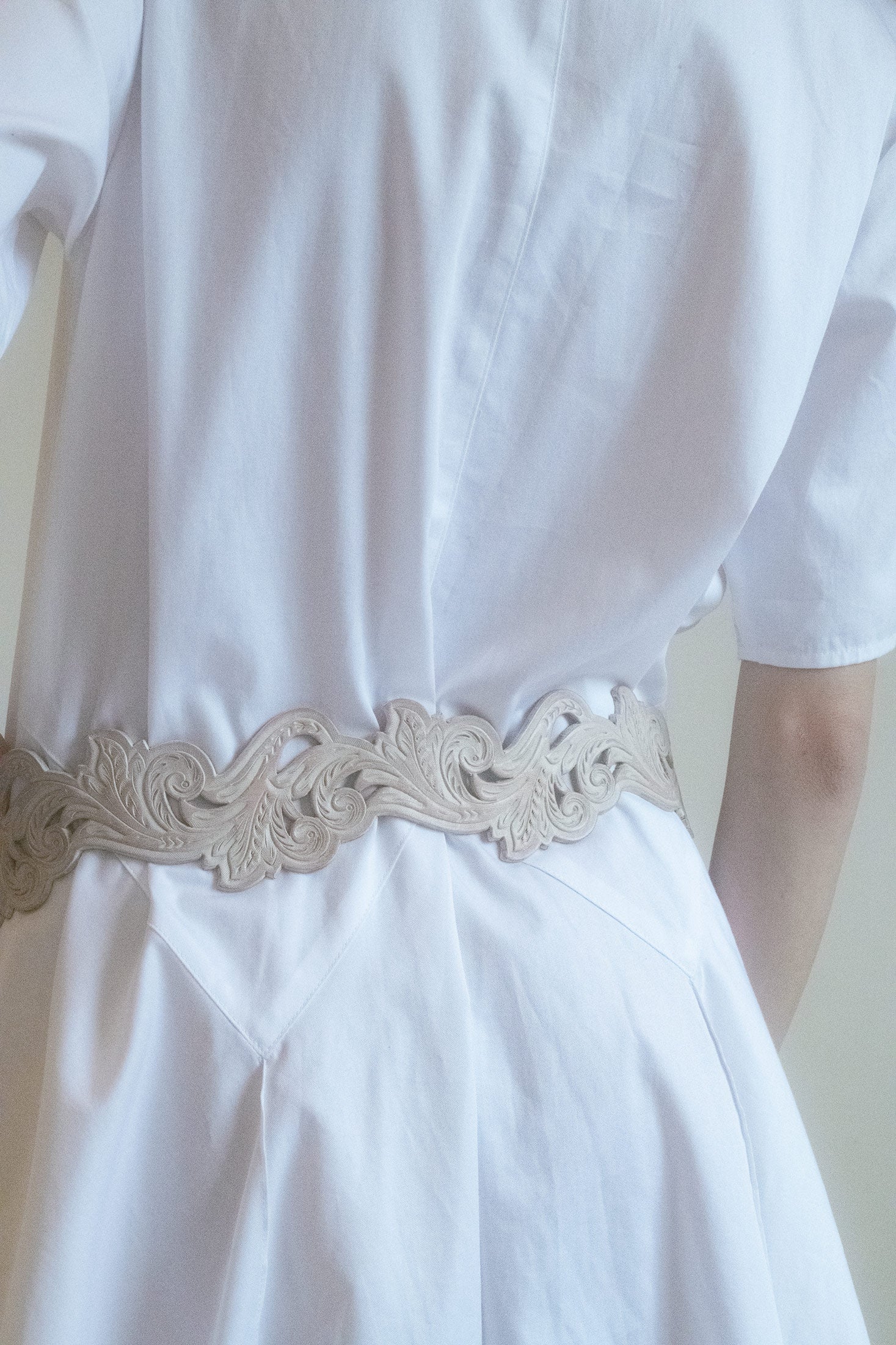 Soft yet powerful, this dress carries an air of mystery—an ethereal piece that feels as much at home in the city as it does in a cinematic scene from a bygone era.
