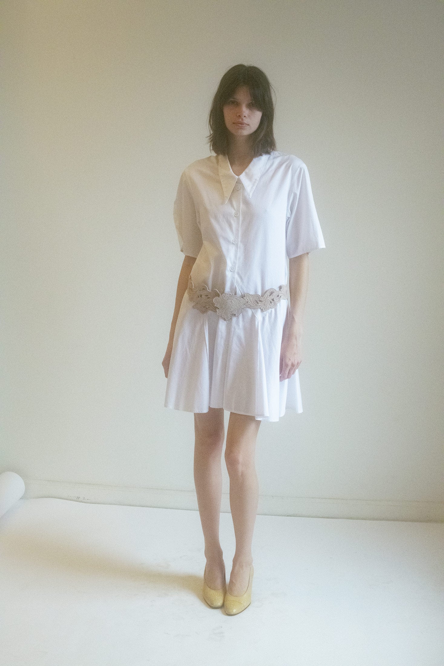 Step into a world where vintage meets modern sophistication with the Collared Shirt Dress.