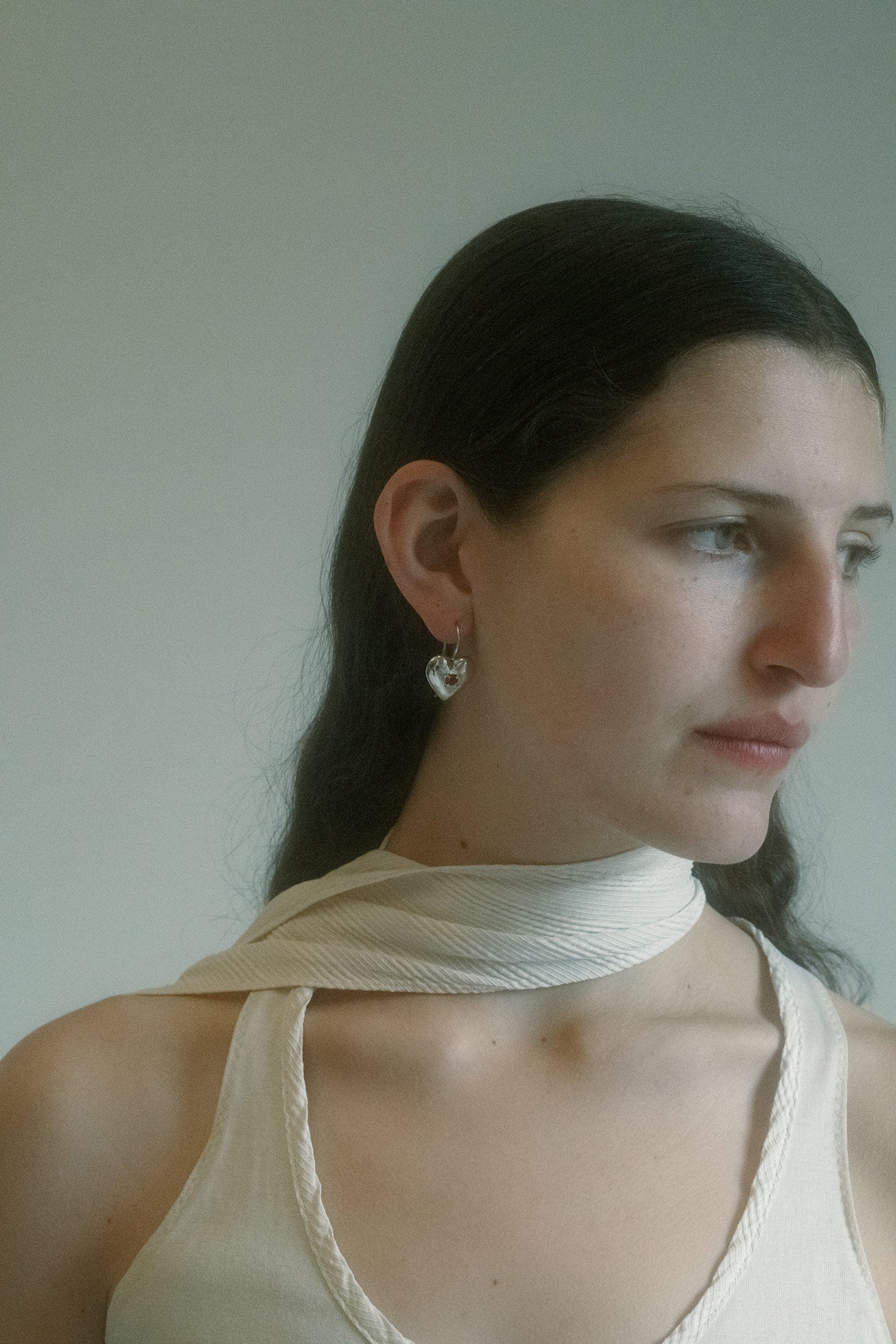 Glamour with a pulse—these drop earrings from Mondo Mondo flirt without a word.