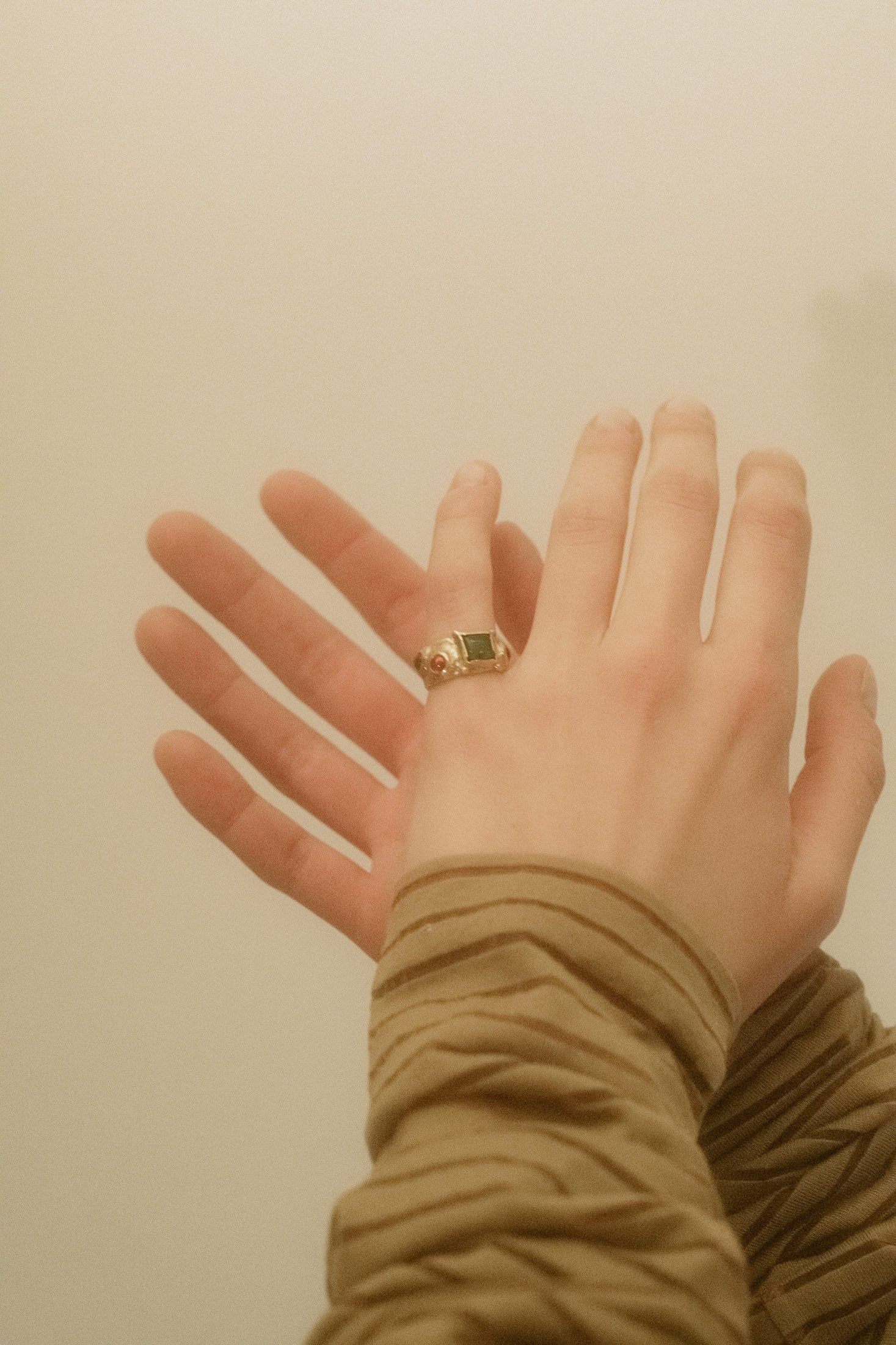 A piece that dances between art and adornment, this sculptural ring from Mondo Mondo is a masterclass in design. Crafted in gold-tone brass, its textured detailing creates an organic flow that mimics the beauty of nature’s most intricate forms.