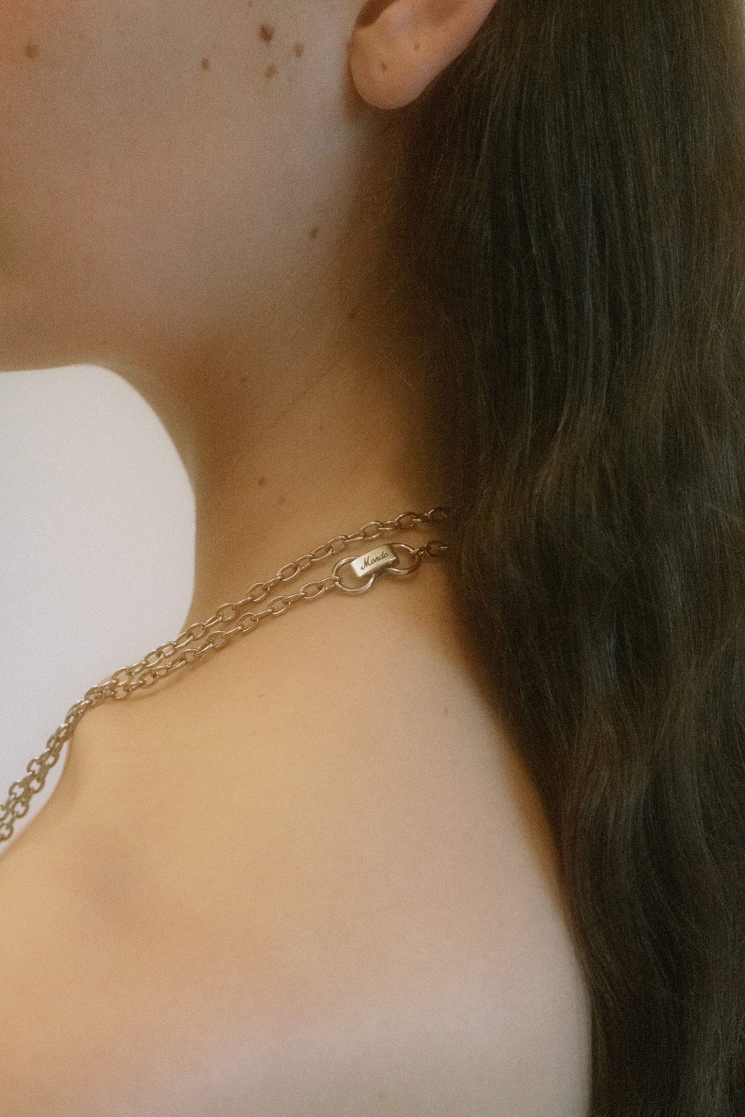 Surrounding the heart, clear crystals delicately frame the design, adding subtle sparkle to this captivating piece. Made in Los Angeles, this necklace is sophisticated, yet daring enough to demand attention.