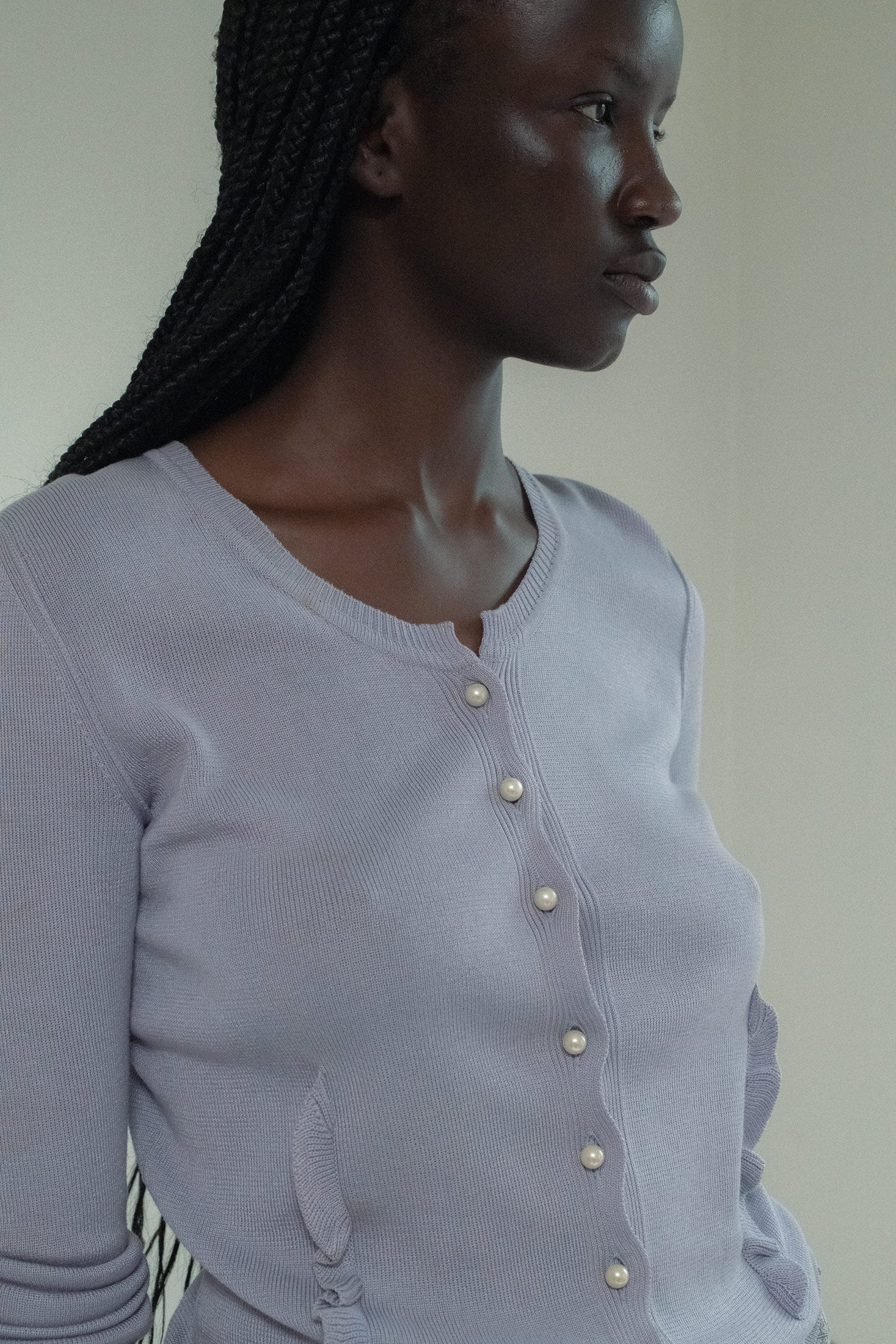 Pearl button closures caught the light like fleeting glances—each one a tantalizing invitation to uncover more.