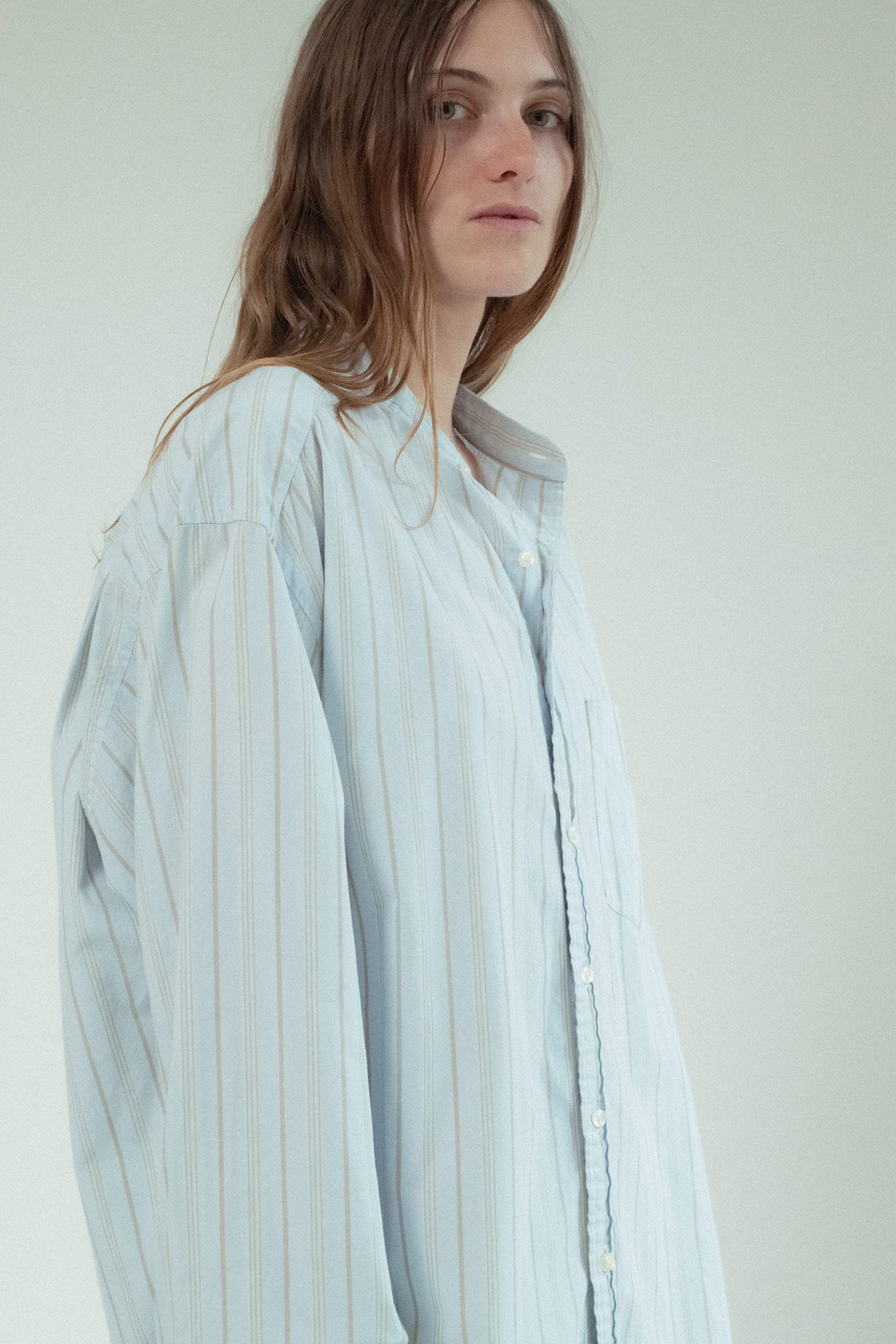 Effortlessly chic, the Gap Button Down in washed light blue is the embodiment of subtle sophistication.