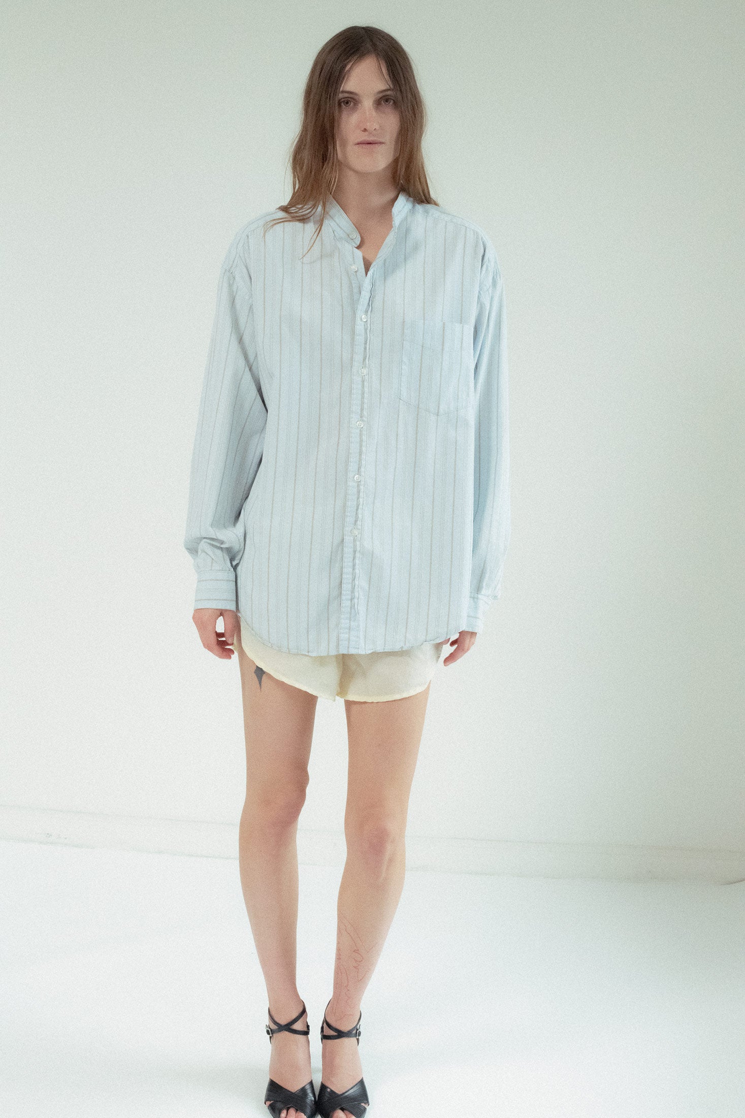 Its oversized yet tailored fit offers the perfect blend of ease and refinement, while the long sleeves add a sense of timeless elegance.