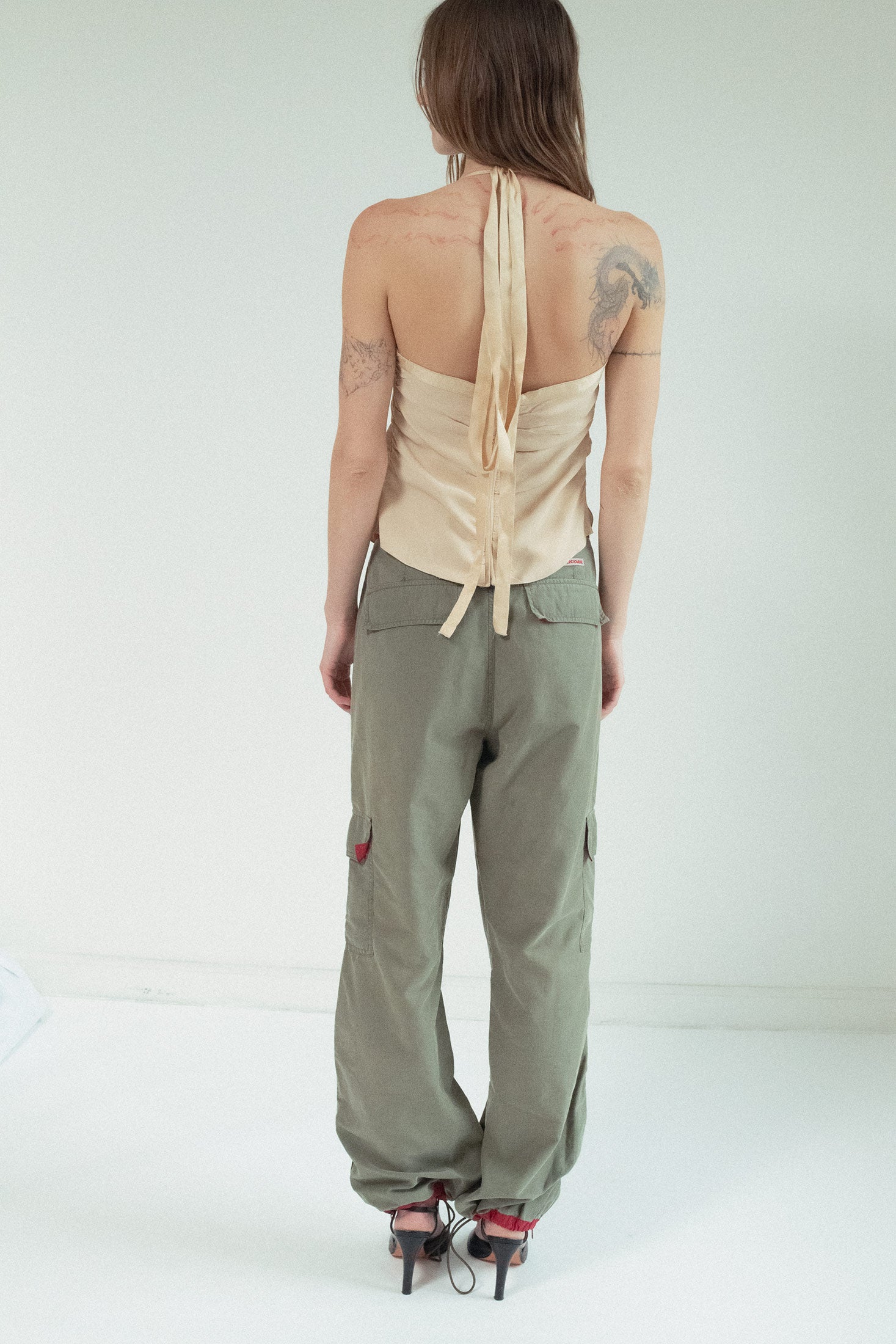 From day to night, these cargo pants are a treasure for the bold and the curious—chic, mysterious, and endlessly wearable.