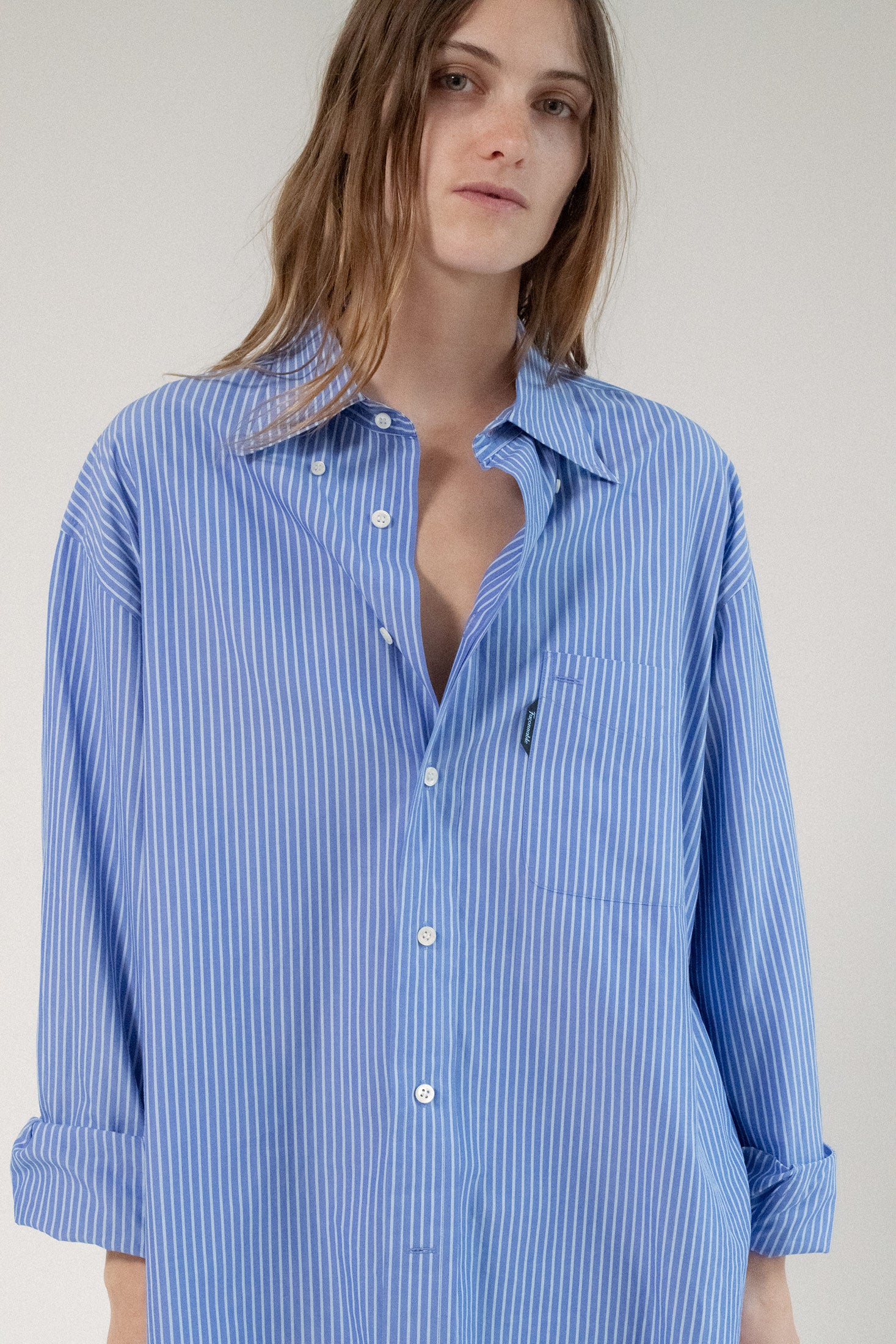 The Faconnable Pinstripe Button Down is a study in timeless sophistication.