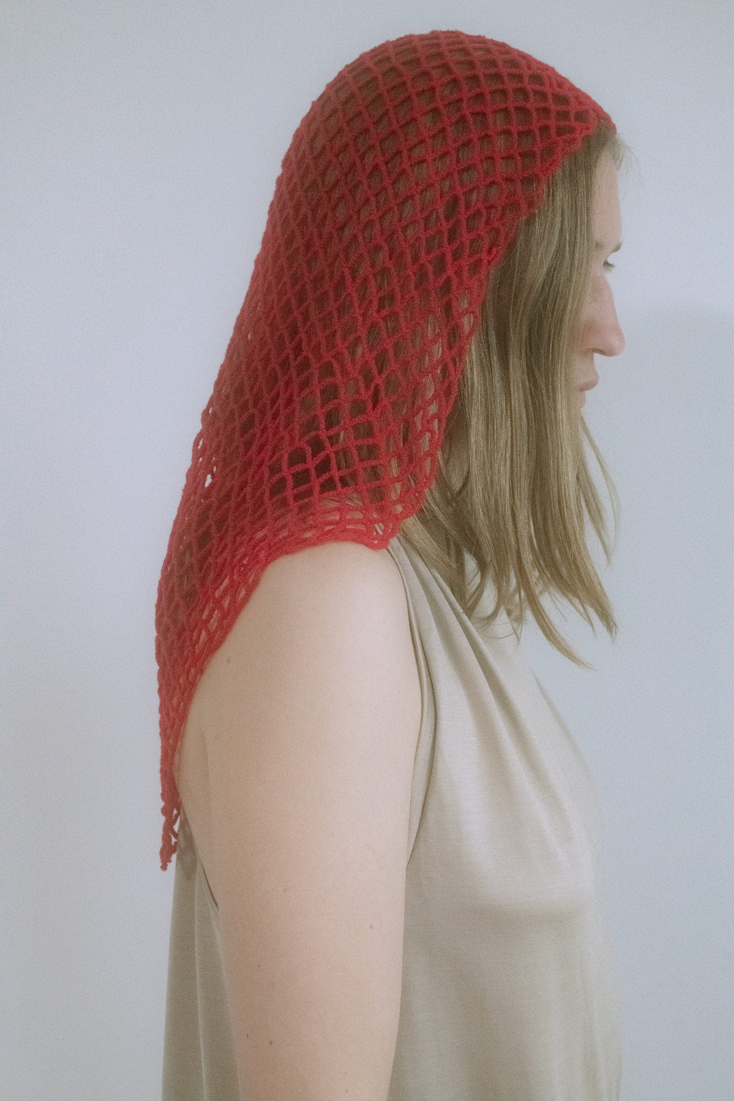 Made in New York, rendered in a vivid red, and shaped with an unplaceable allure.