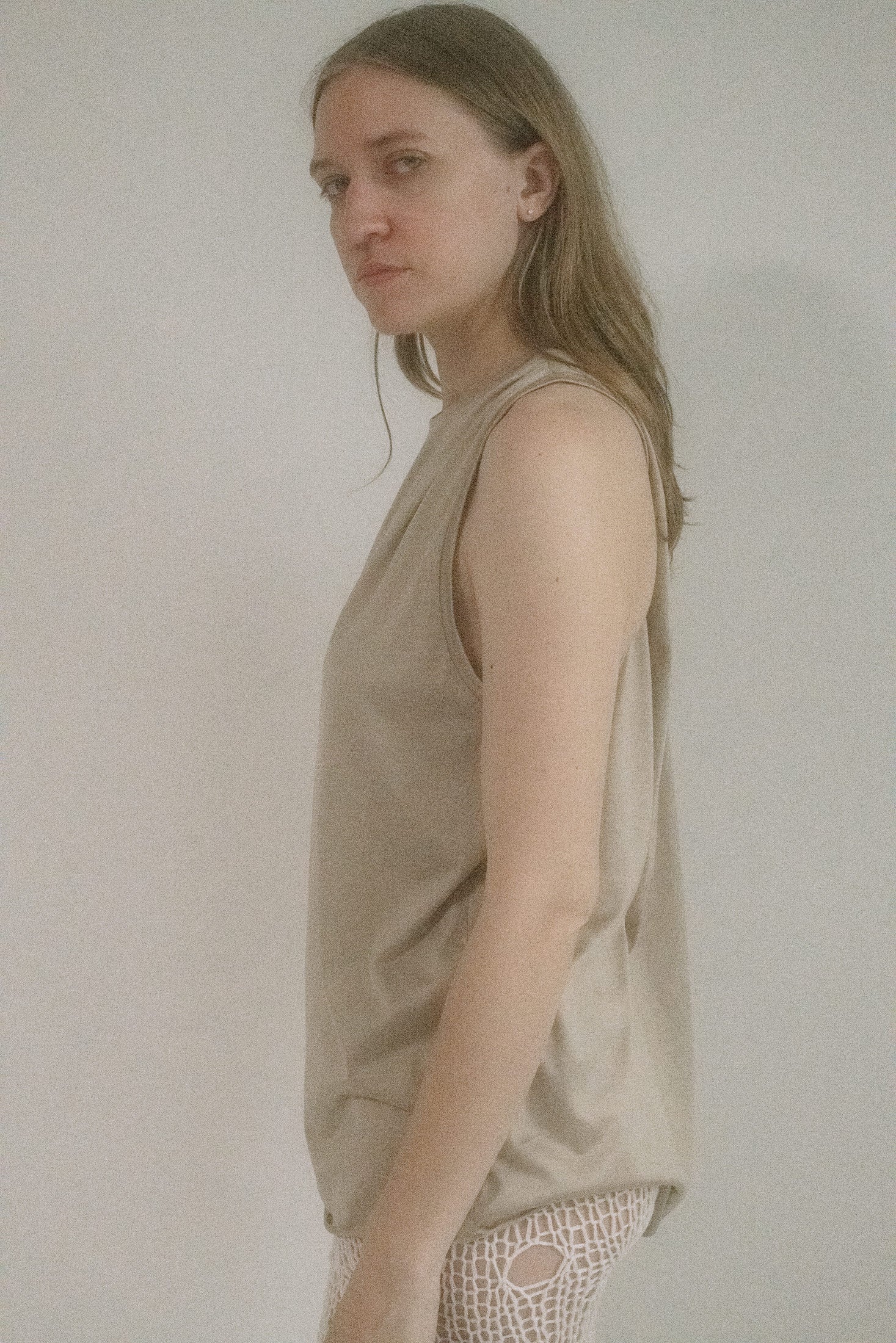 The fit is relaxed, the racerback detail barely flirtatious, and yet, it simmers.