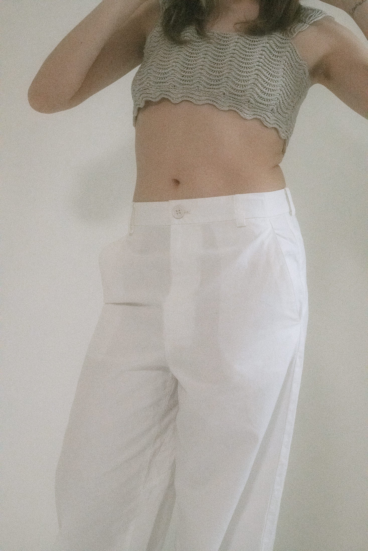 Designer Judy Turner’s high-waisted sailor pants command the room in crisp white, where classic meets rebellious edge.