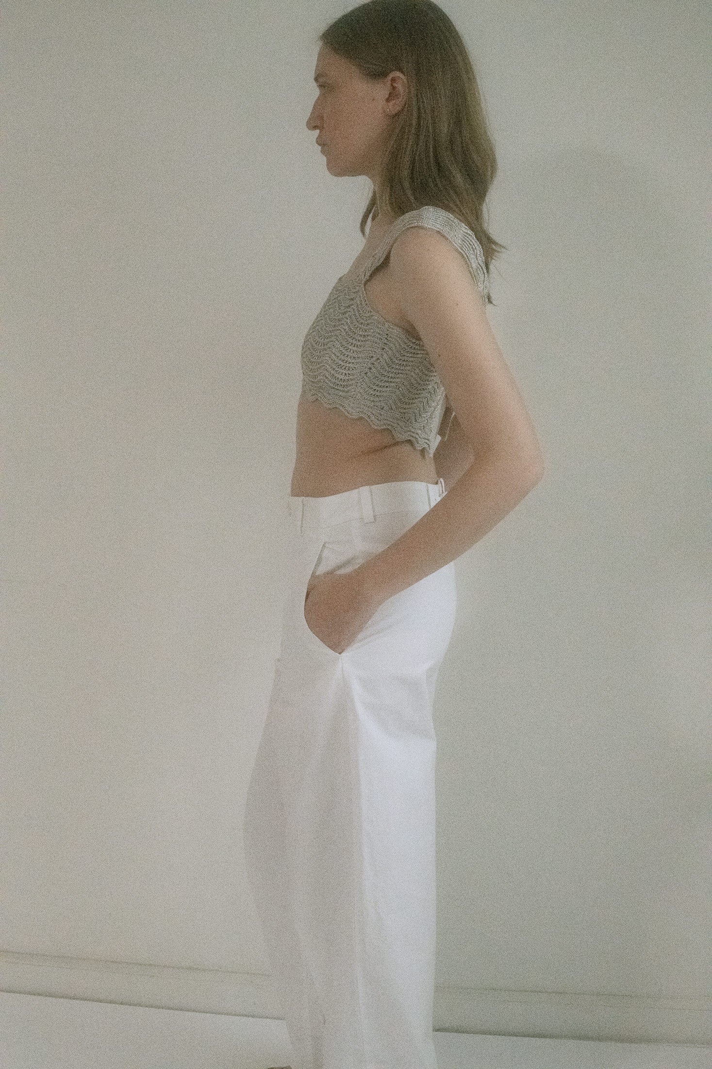 This one-of-a-kind knit bra top from Judy Turner, crafted in New York, serves soft seduction in a glacial silvery hue.