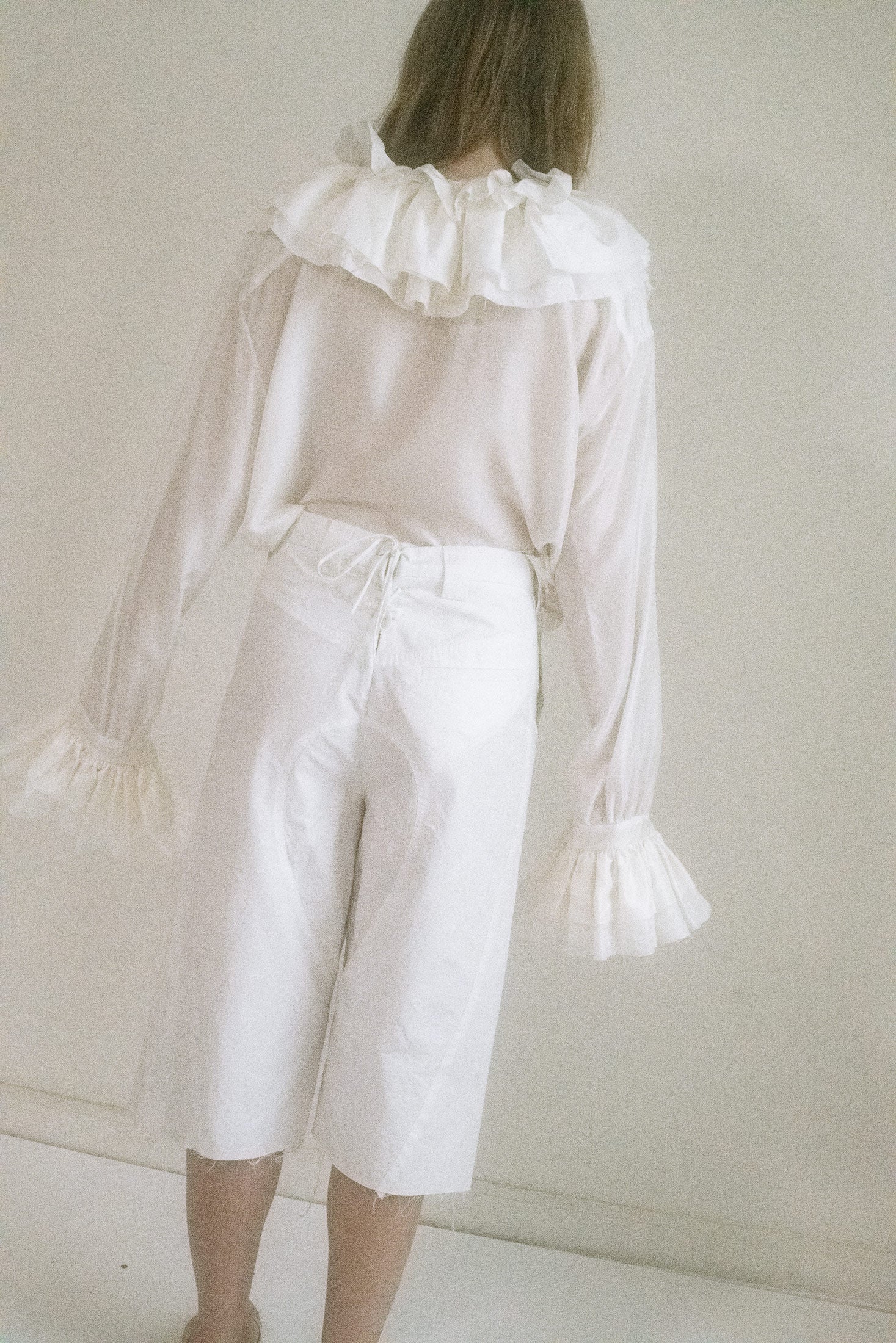 ELONGATED SHORTS