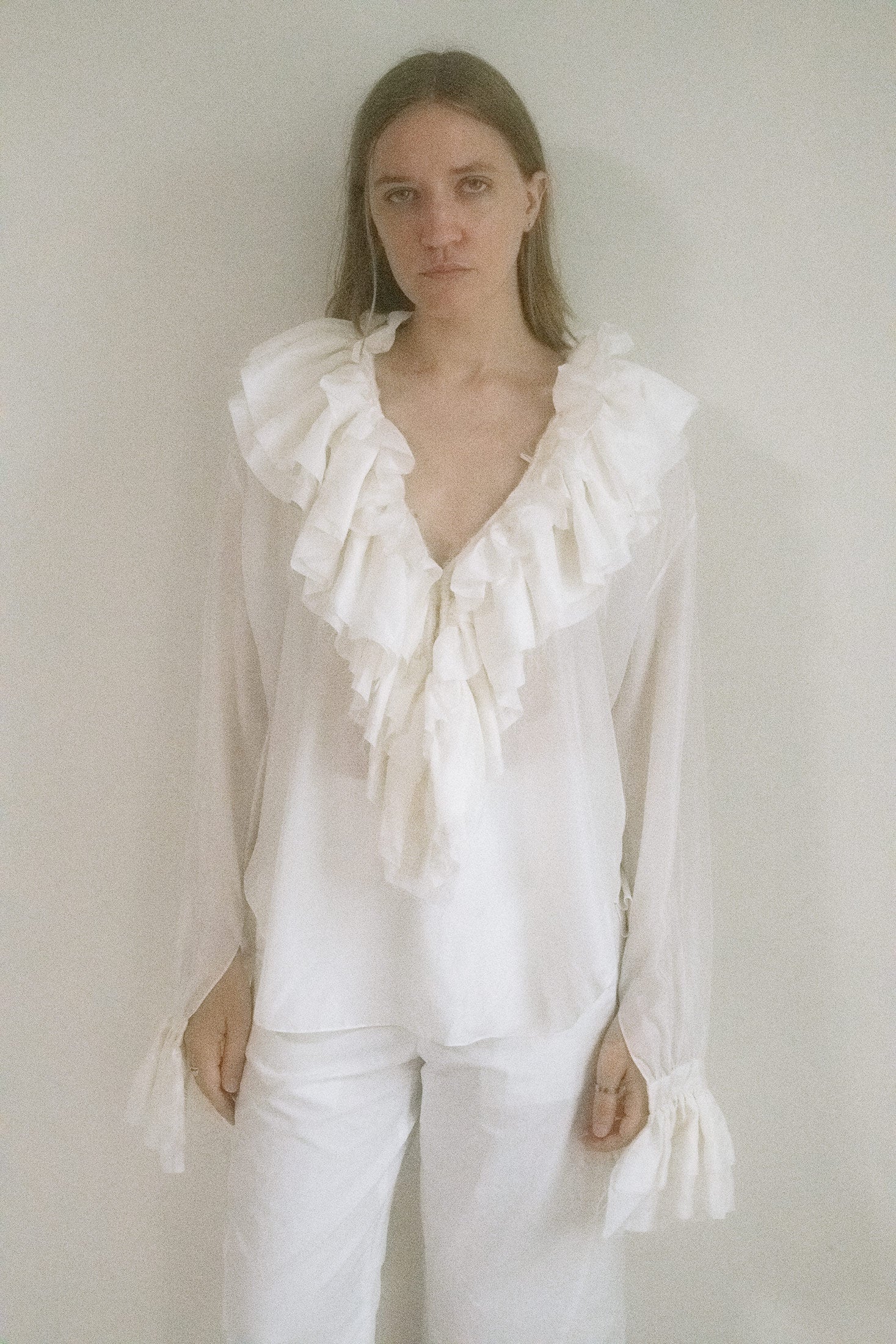 From Judy Turner’s New York studio comes a blouse that doesn’t just enter a room—it drifts in.