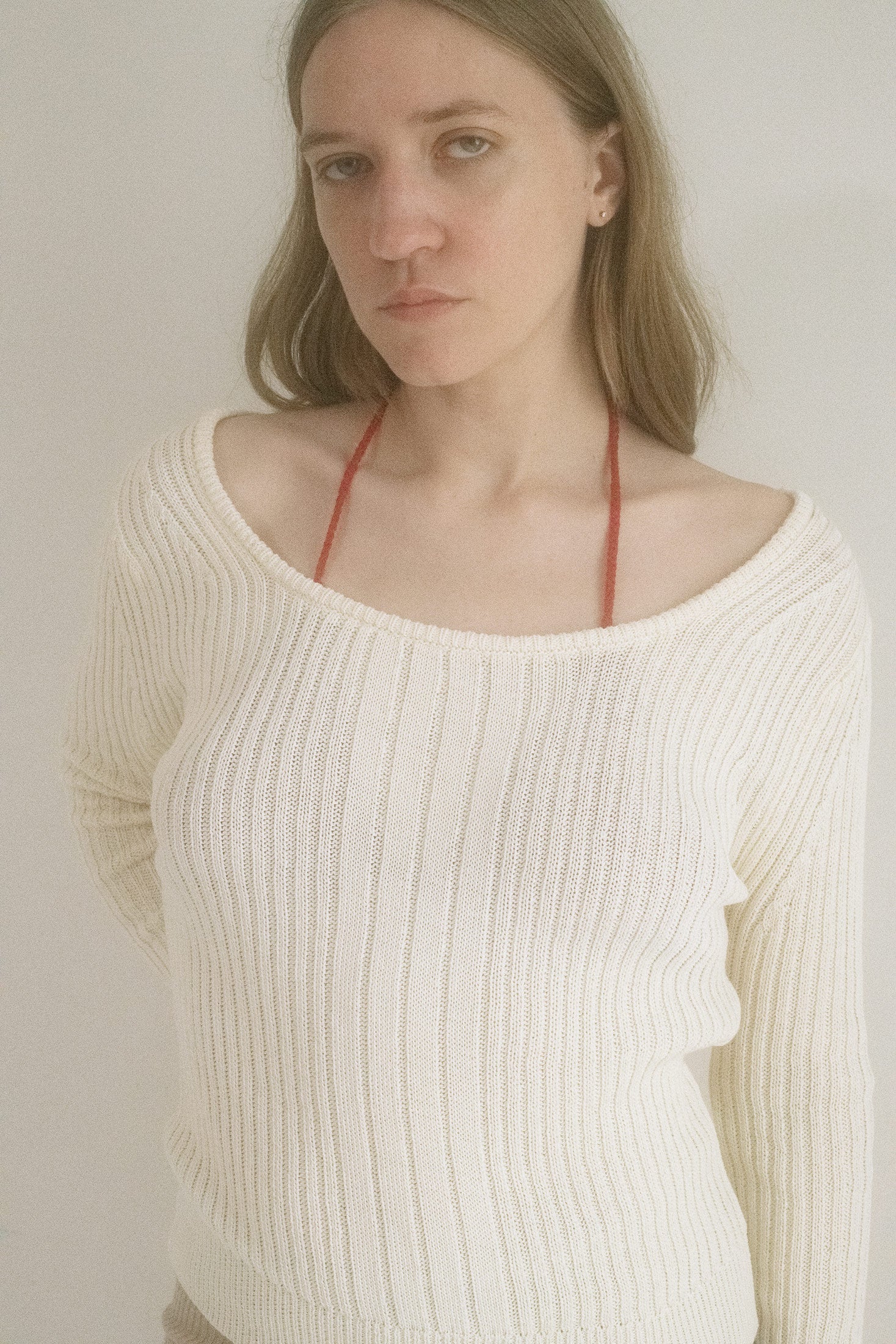 Made in New York, this long sleeve scoop neck top is rendered in a buttery cream—soft as a secret, light as a dare.