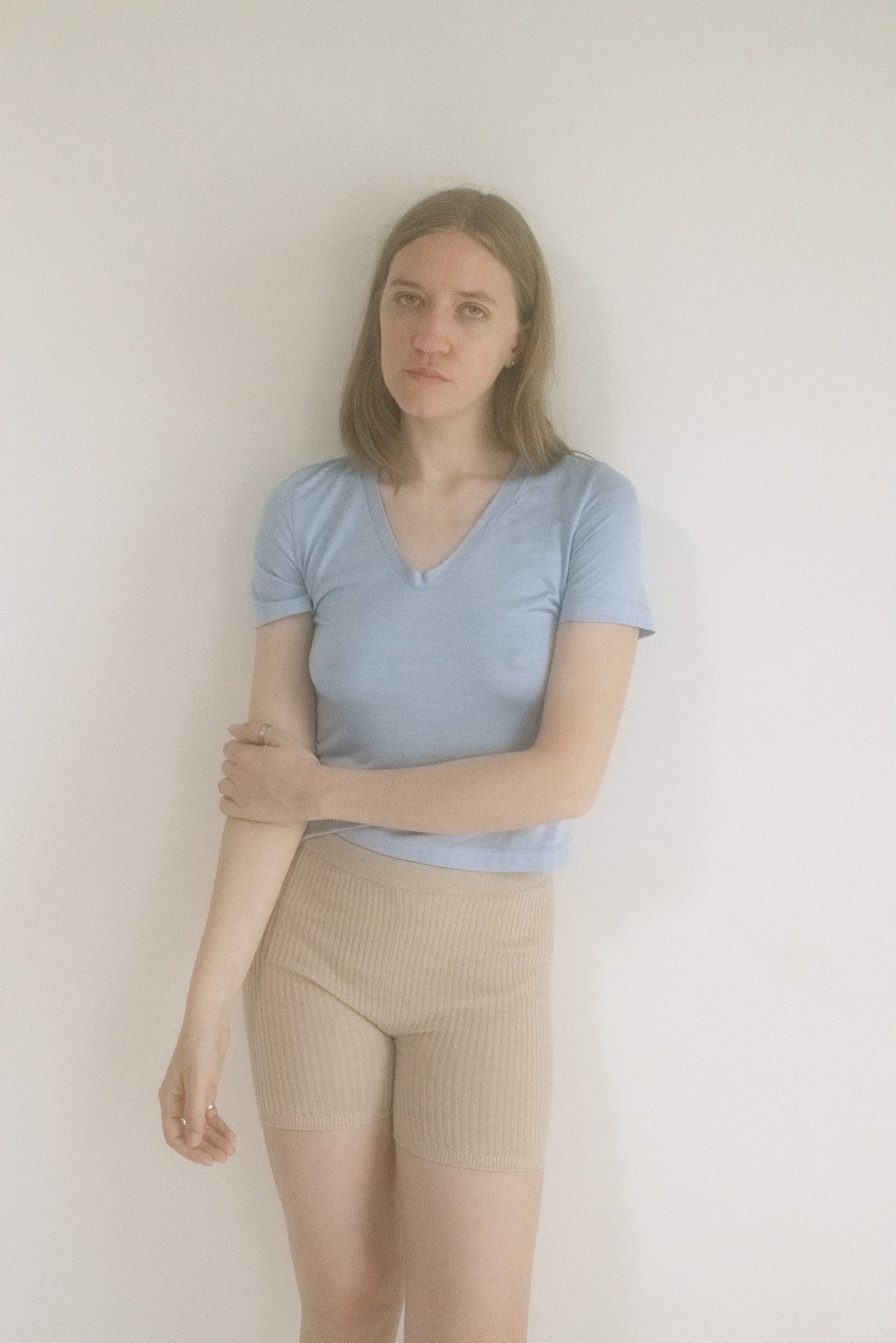 Short sleeves frame the arms, while the soft fabric clings and falls in all the right places.