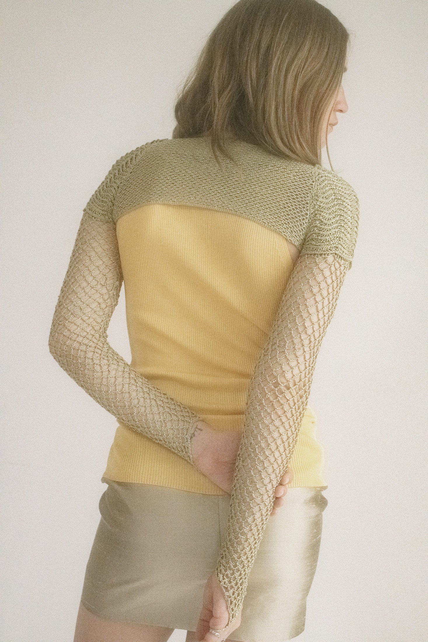 This piece is romantic, undone, and just a little off-center.