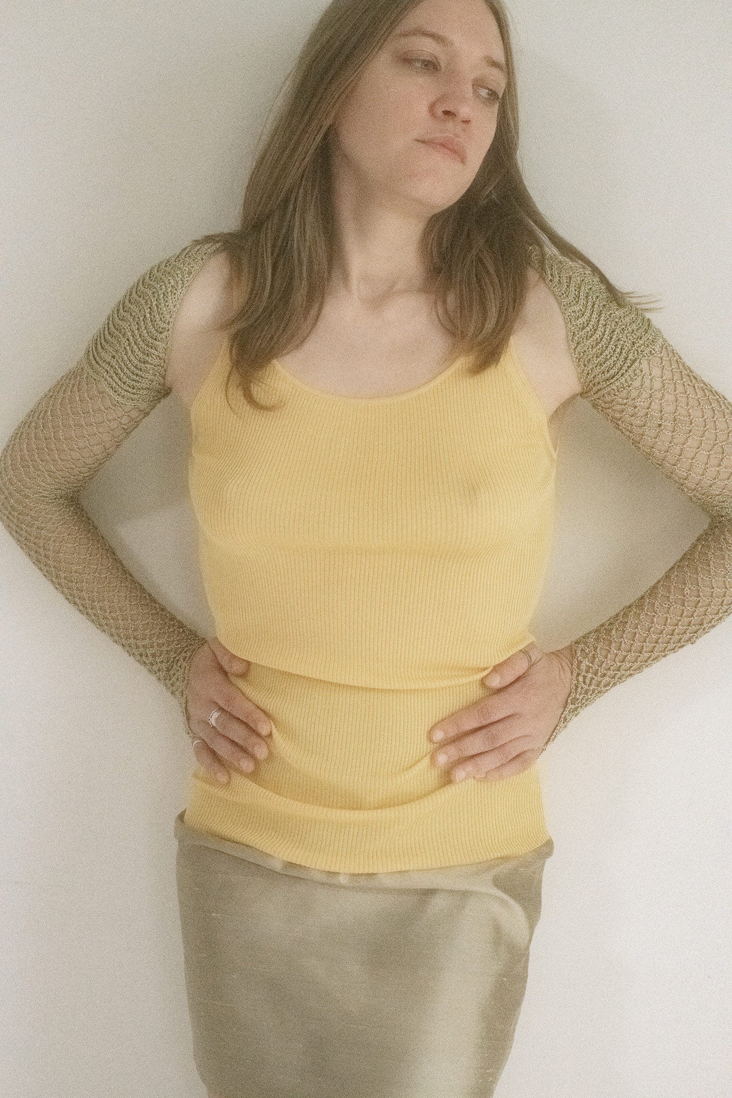 Cropped and long-sleeved, it slips on like a whisper but lingers like a plot twist.