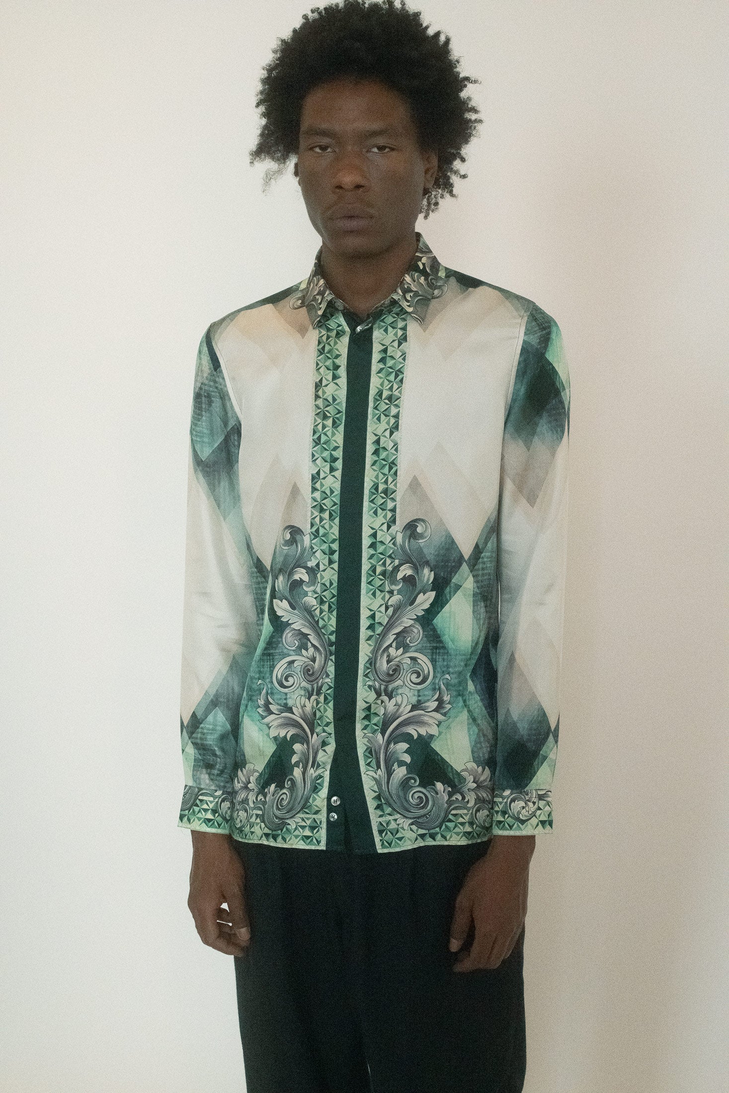 Equal parts seduction and armor, this shirt is a relic of glamour threaded with intent.