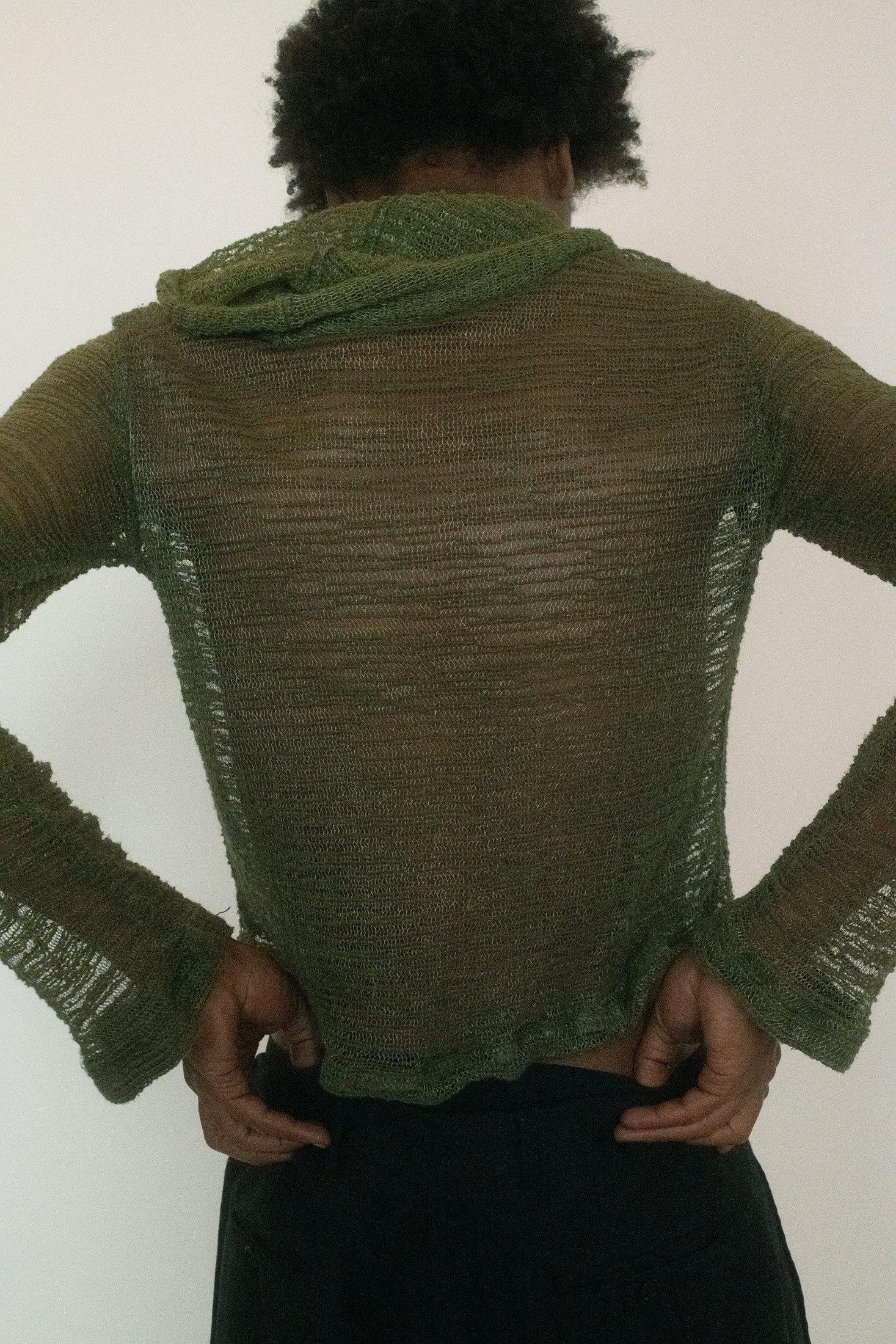 It’s casual in form but carries a charged undercurrent, something you’d wear in the wings before stepping onto a stage or slipping into a scene you’re not supposed to.