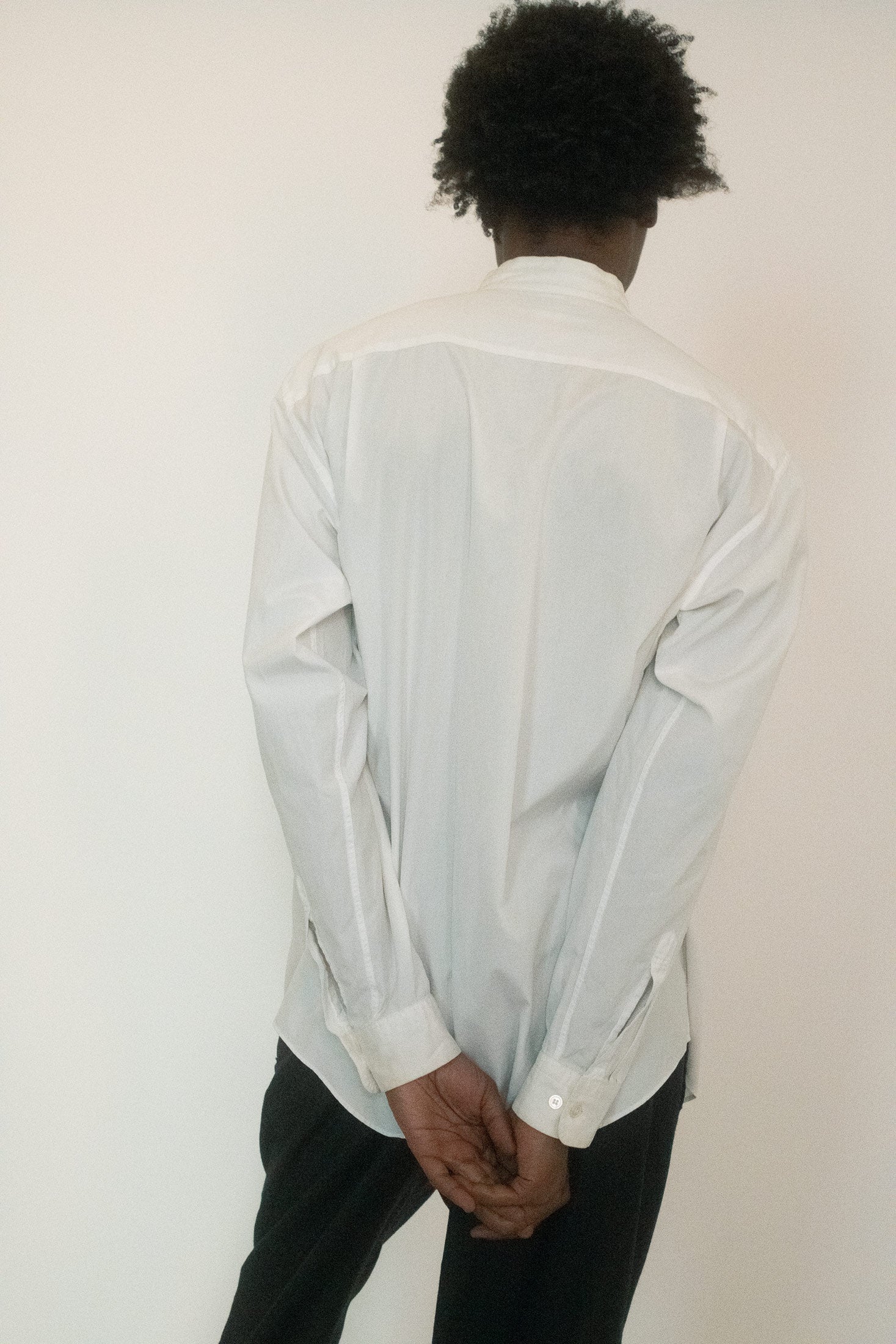An exercise in purity, where the ordinary becomes magnetic, and a shirt becomes something more than itself.
