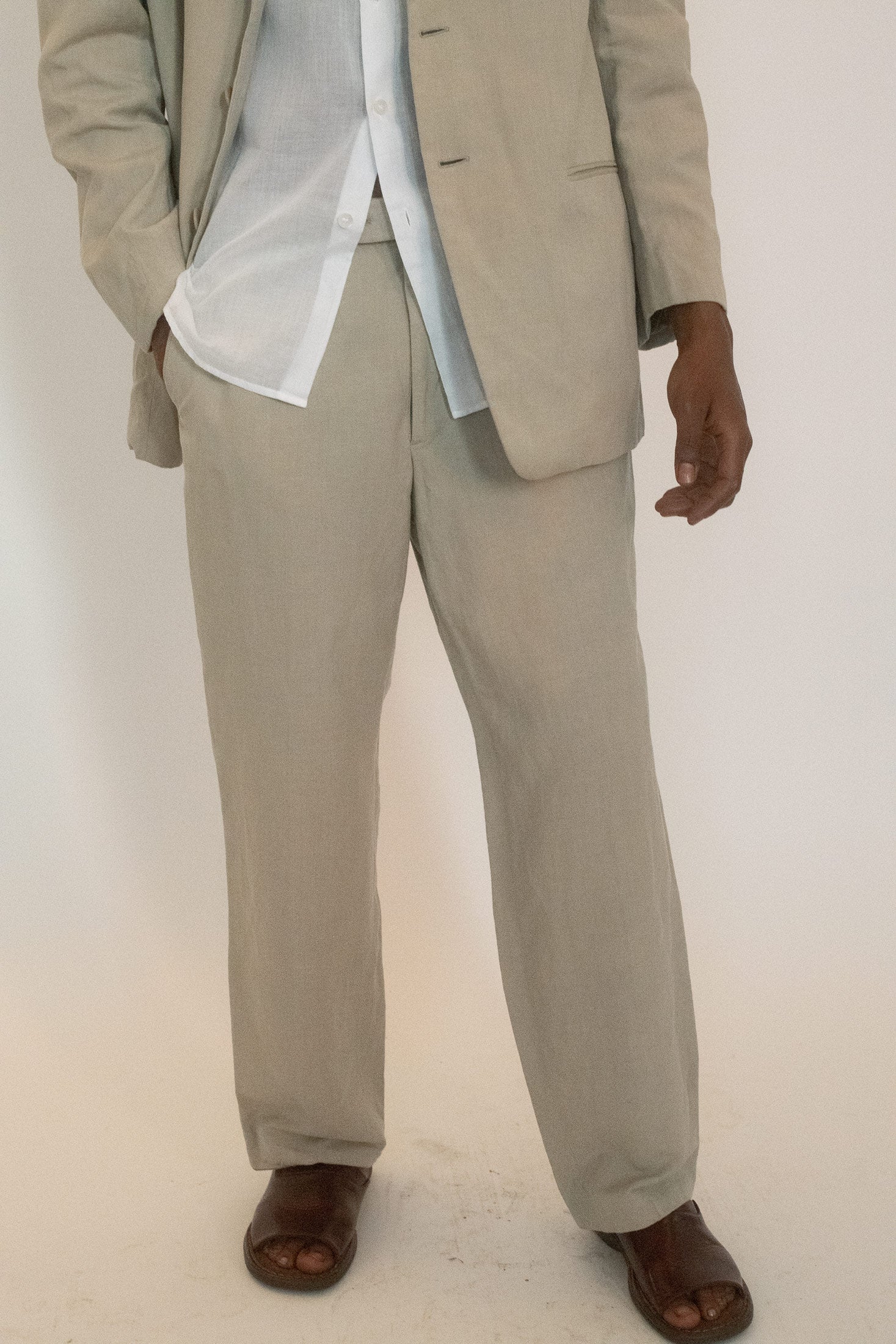 In a tan shade, the classic shape takes on a quiet confidence, equally suited for the formal or the undone.