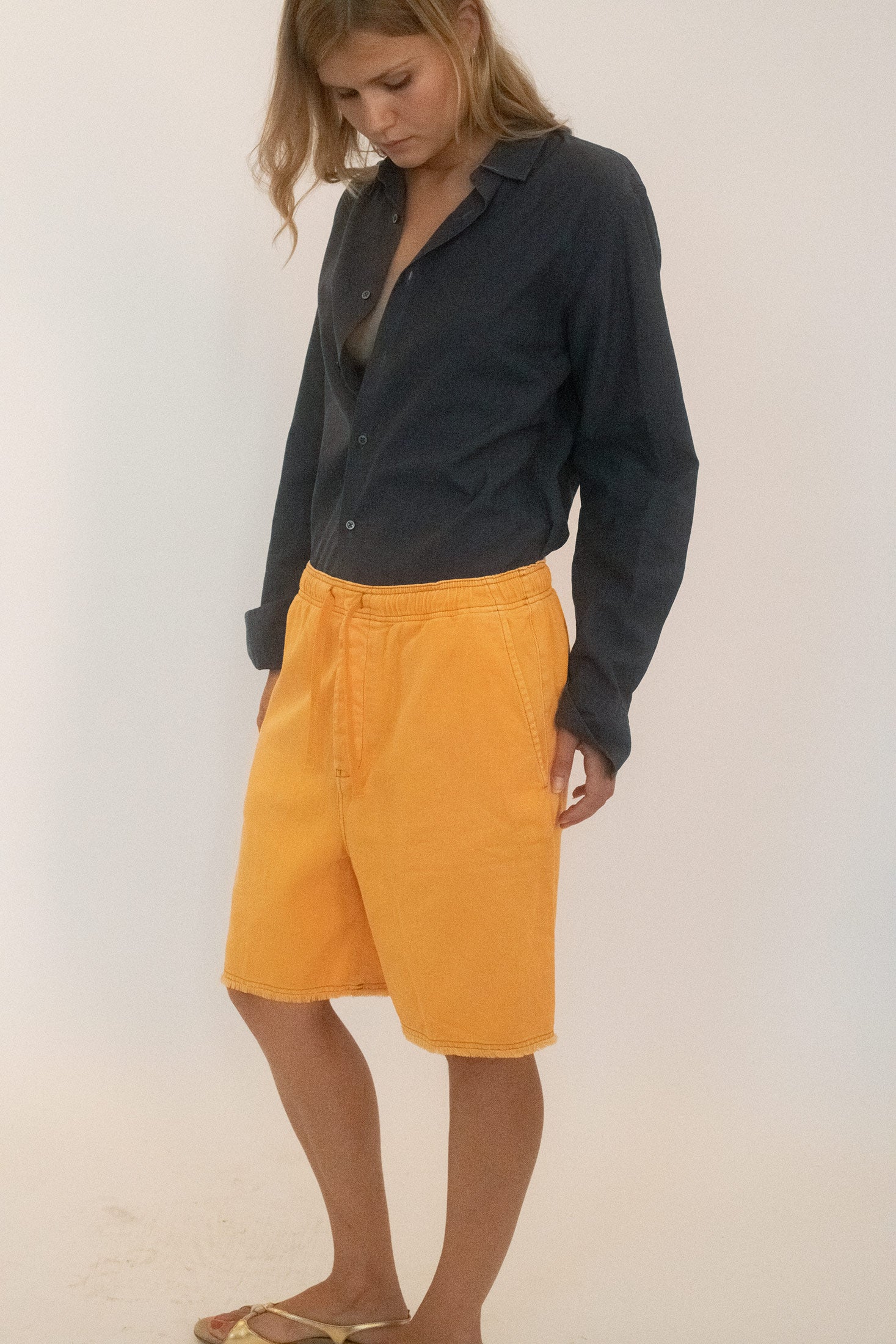 Muted yet impossible to ignore, these shorts are like a sunburn that insists on being remembered.