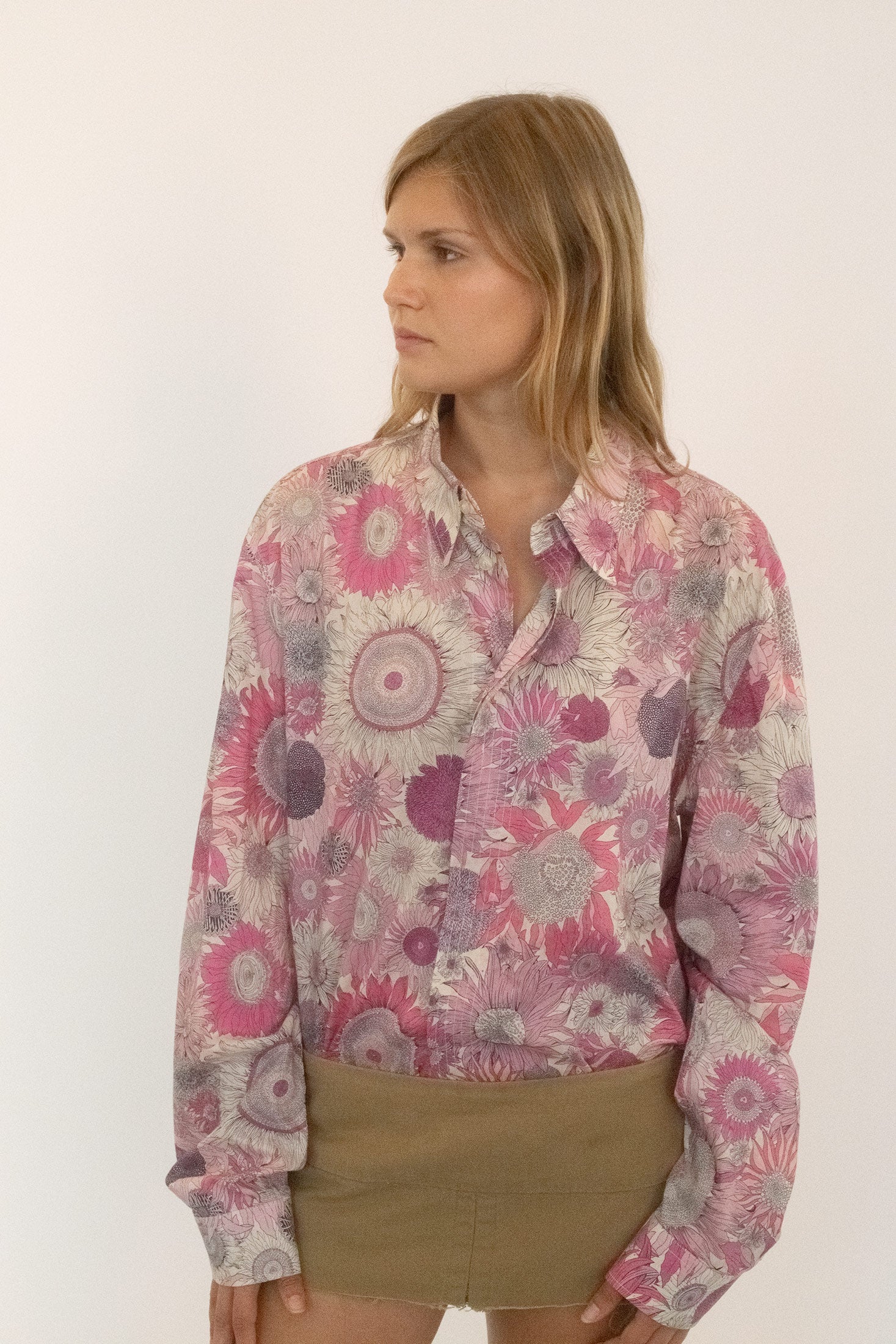 In khaki cotton with a raw hem and an invisible zip at the back, it carries the clean efficiency of Americana but undercut with a sense of risk.