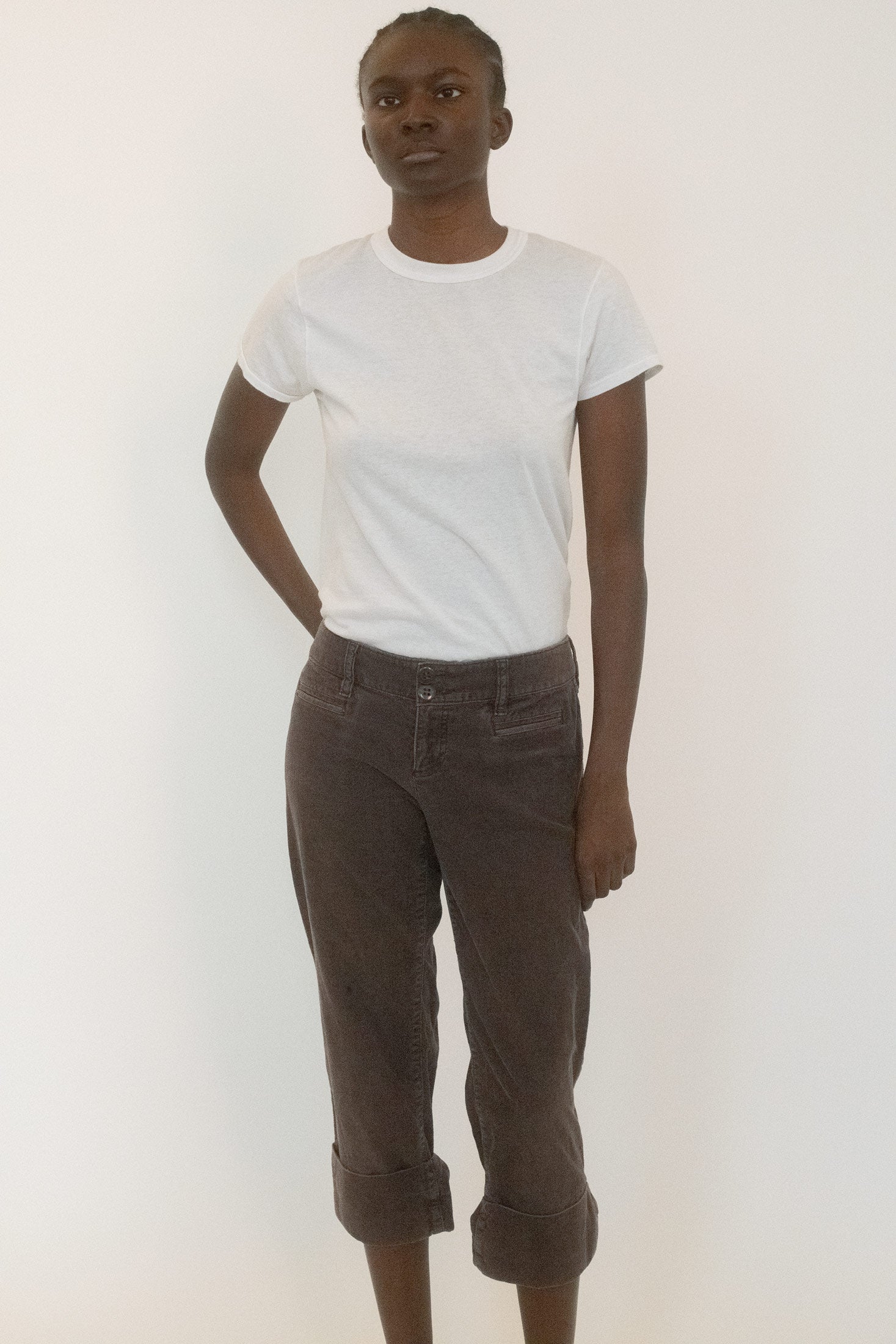 Made in plush chocolate corduroy, carrying the weight of something both playful and illicit.