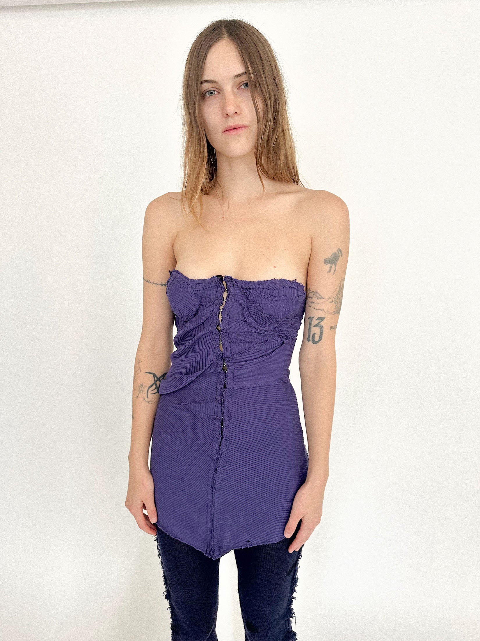 A bustier style tunic by Talia Byre, a one of a kind piece that balances precision and play.