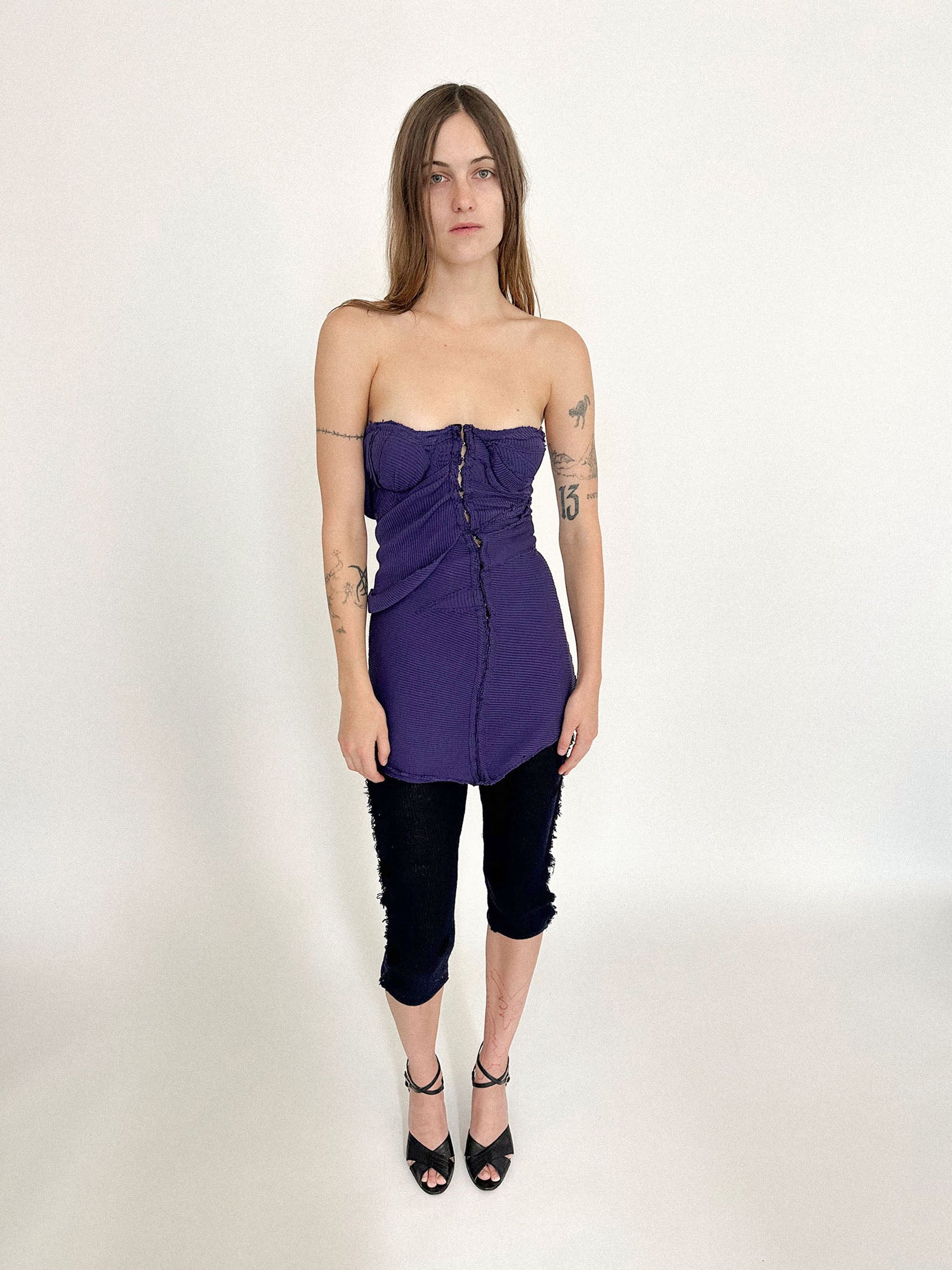 The purple and black stripes pulse with quiet rhythm - graphic, almost hypnotic.