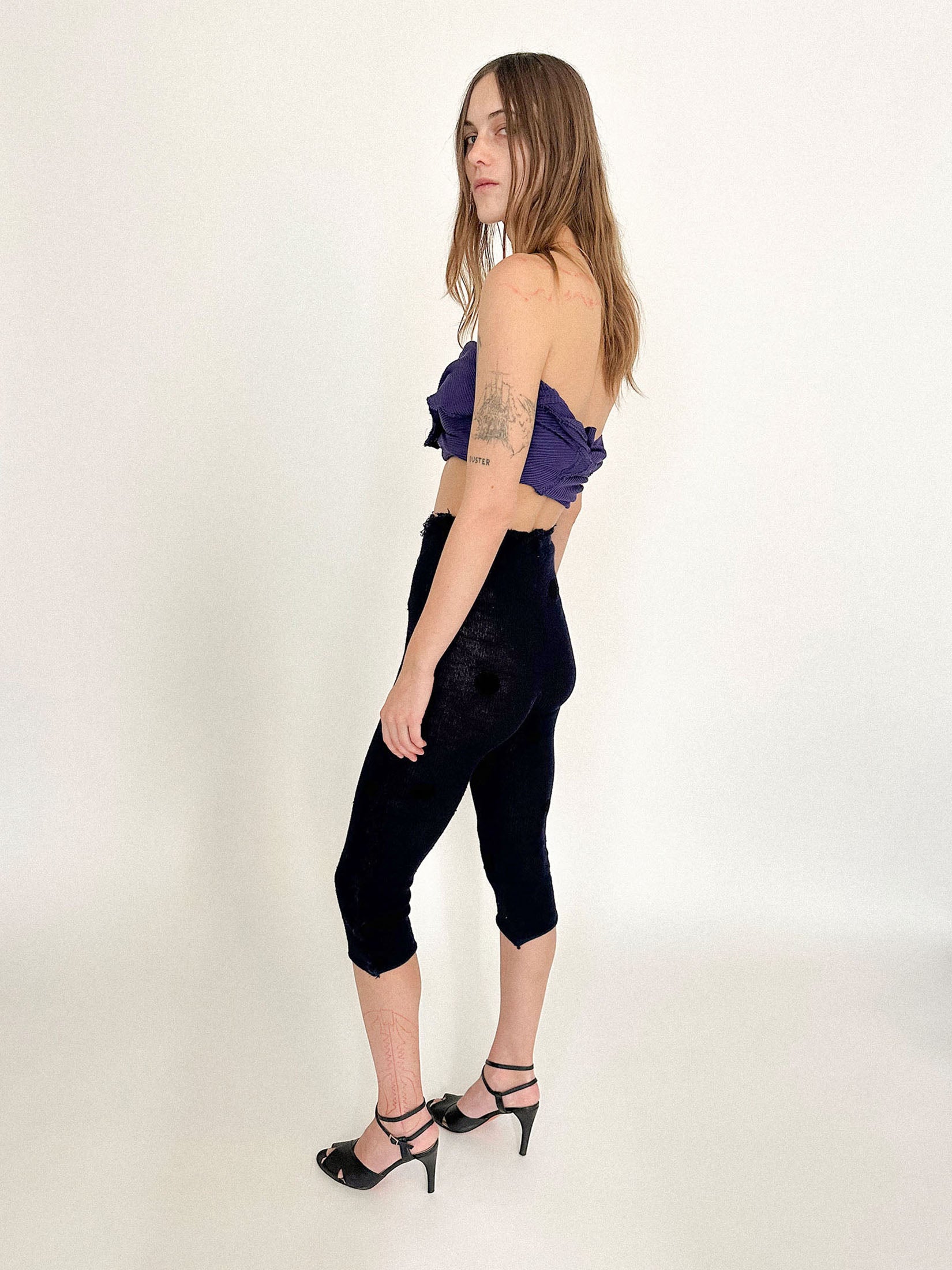 An elastic waistband keeps the shape grounded, practical yet intimate, like something meant to move with you.