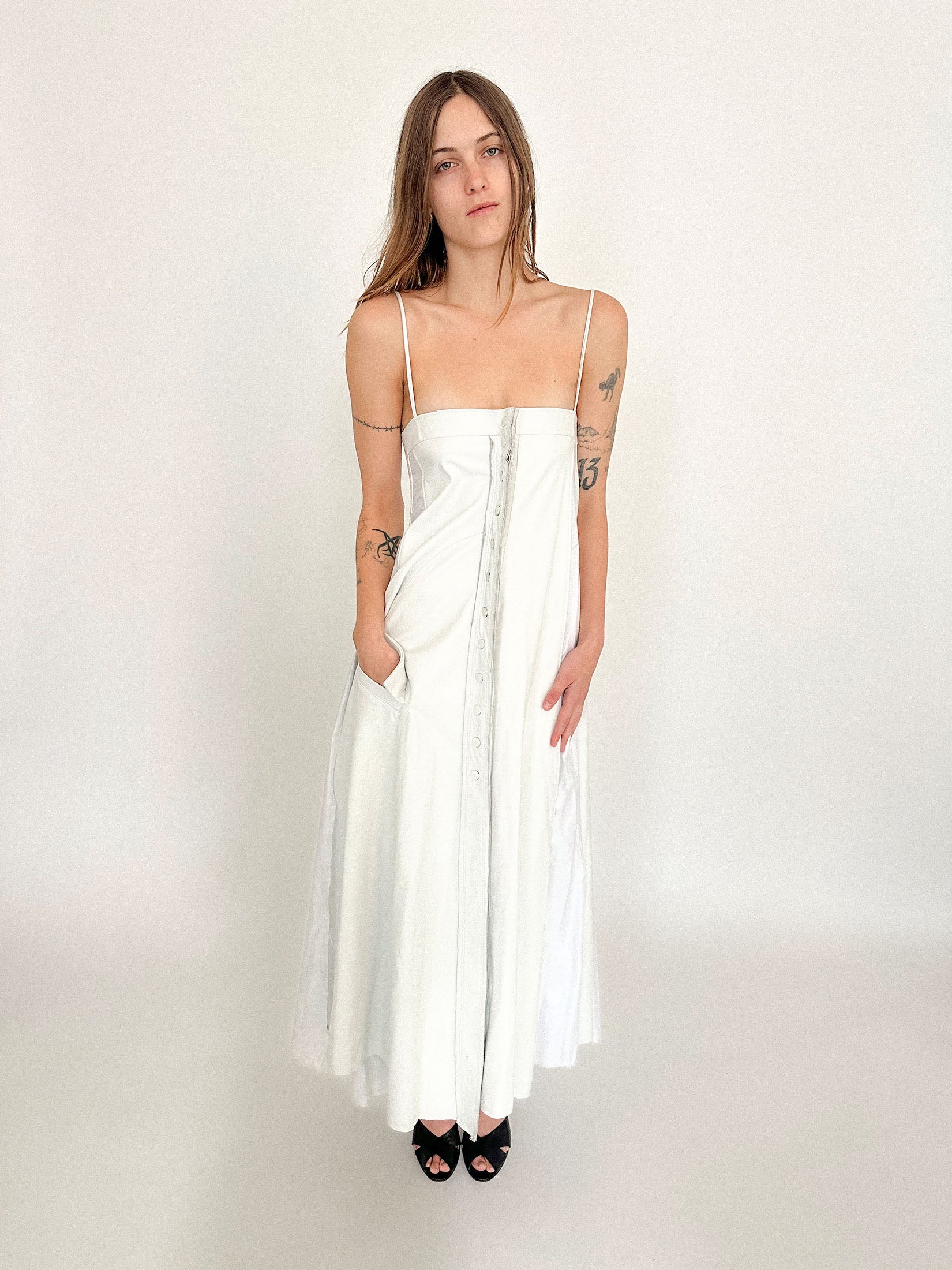 A subtle pocket detail hides in plain sight, grounding the fantasy in function.