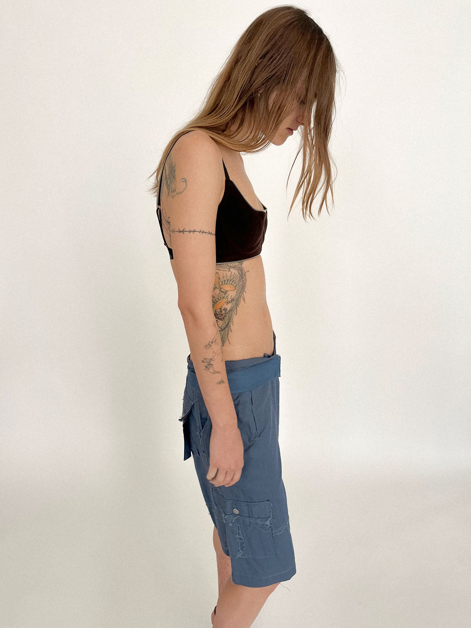 Cut from a thick wool, it blurs categories - lingerie meets armor, tailored restraint meets quiet heat.