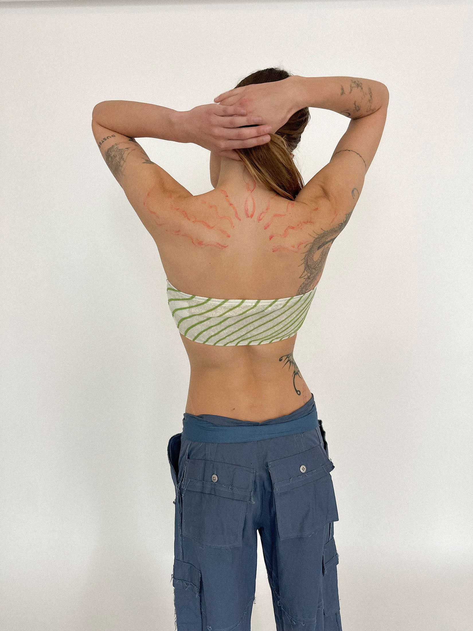 It can be worn on its own or layered, a piece that shifts tone depending on what you dare it to mean.