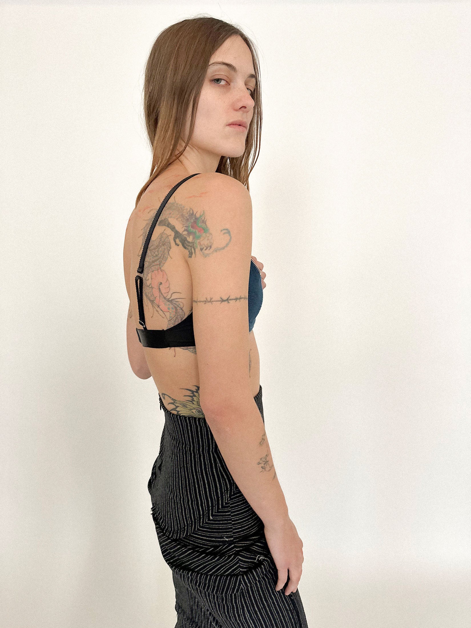 Cut from a thick wool, it blurs categories - lingerie meets armor, tailored restraint meets quiet heat.