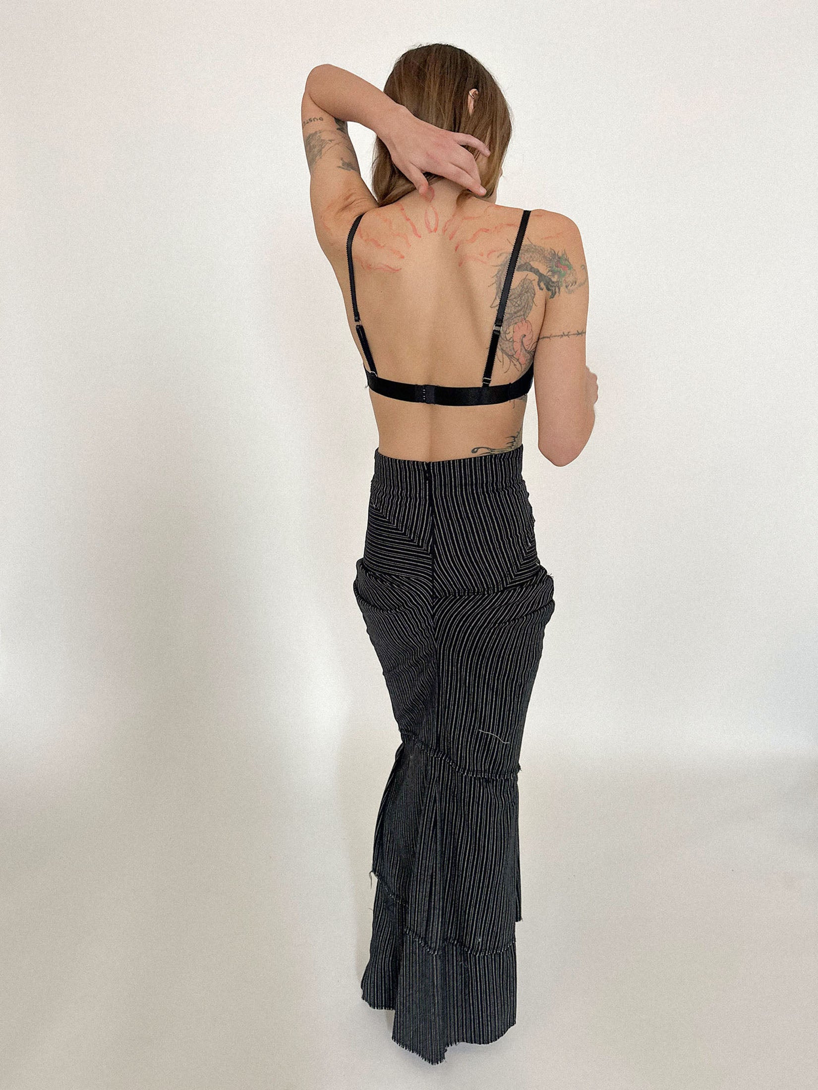 Full length with a slight high-low hem, it plays with proportion like dialogue.