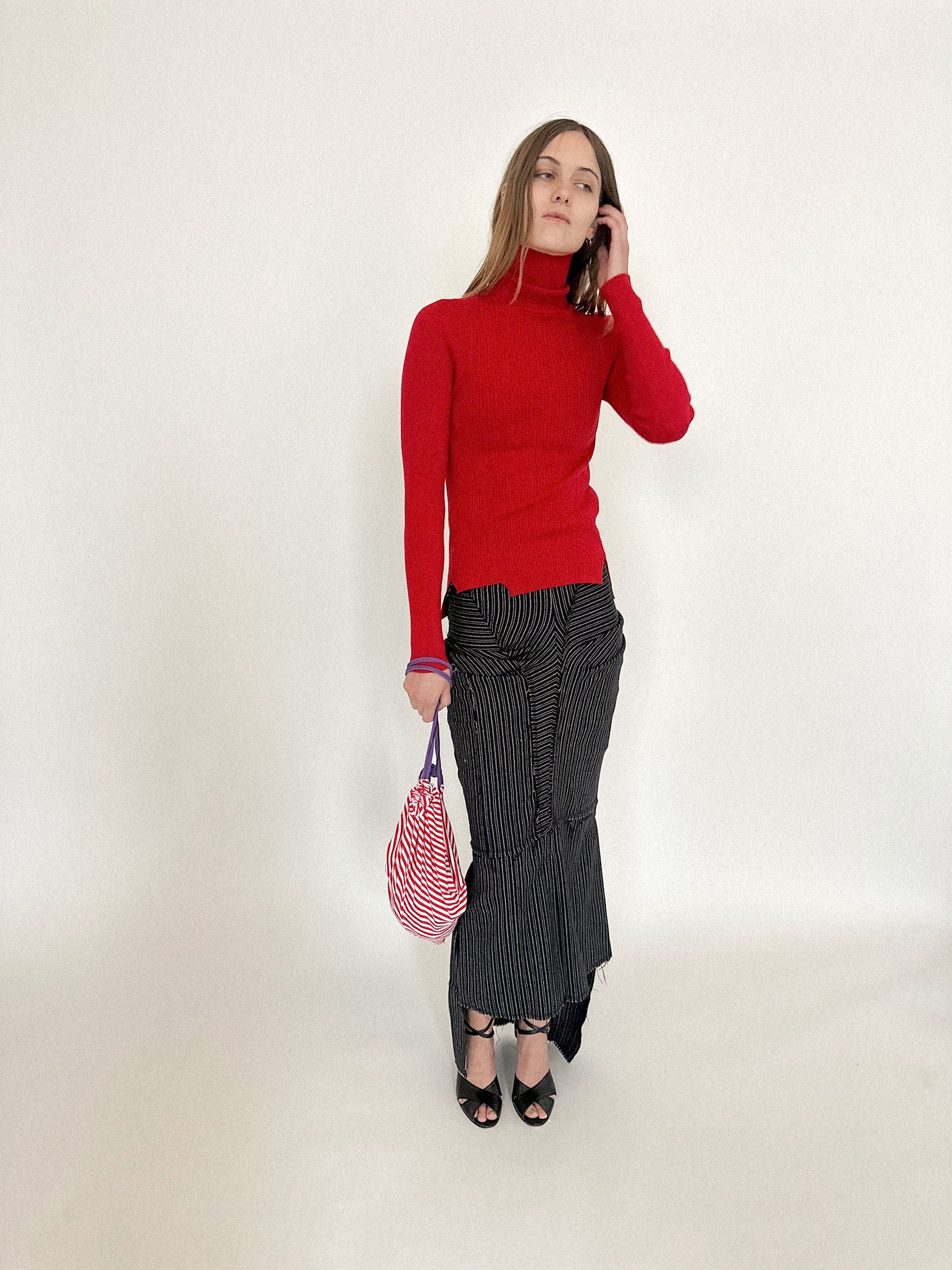 A jersey drawstring bag by Talia Byre, a one-of-a-kind sample that feels equal parts playful and deliberate.